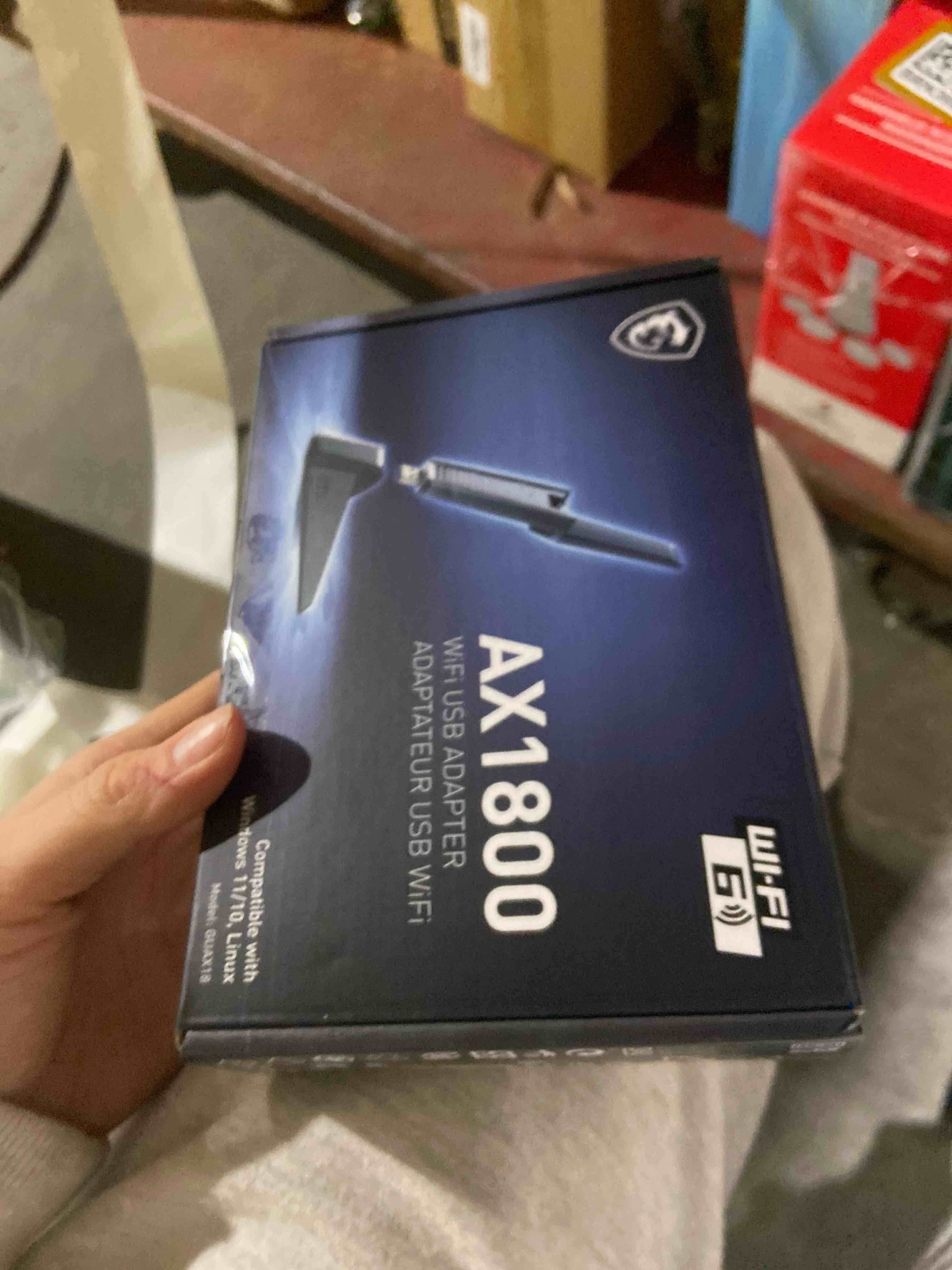 Condition photo showing New/Like New for MSI AX1800 WiFi 6 Dual-Band USB Adapter - WLAN up to 1800 Mbps (5GHz 2.4GHz Wireless) USB 3.2 Gen 1 Type-A MU-MIMO Adjustable Antenna Beamforming WPA3 - Wired Bracket Included
