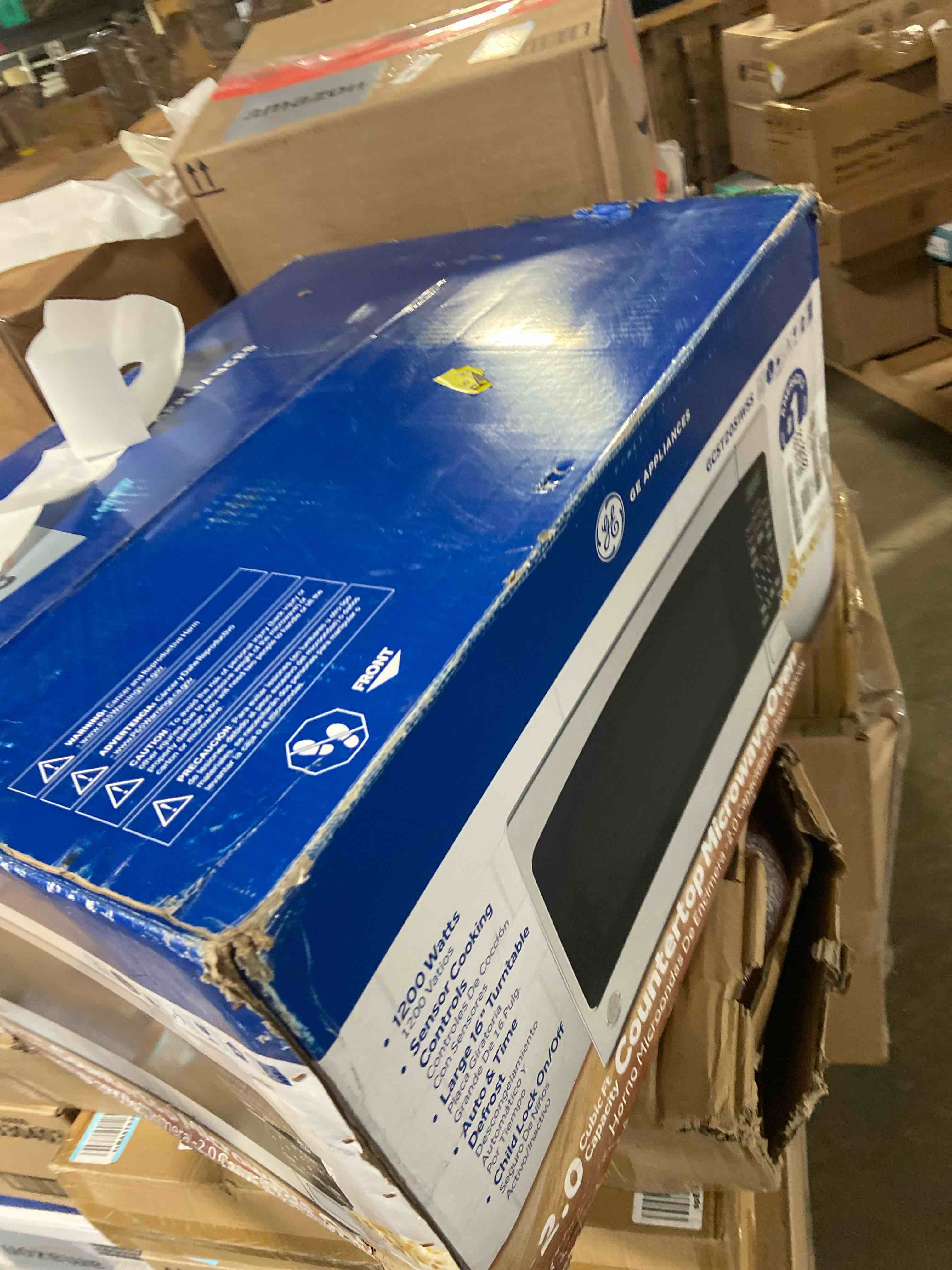 Condition photo showing New/Like New for GE Countertop Microwave Oven,1, 200-watt Capacity, 2.0 Cubic Ft., 8 Auto Setting Cooking Settings, Child-Lock Technology, Kitchen Essentials for the Countertop, Dorm Room or Apartment, Stainless Steel 2.0 Cu.Ft. Stainless Steel