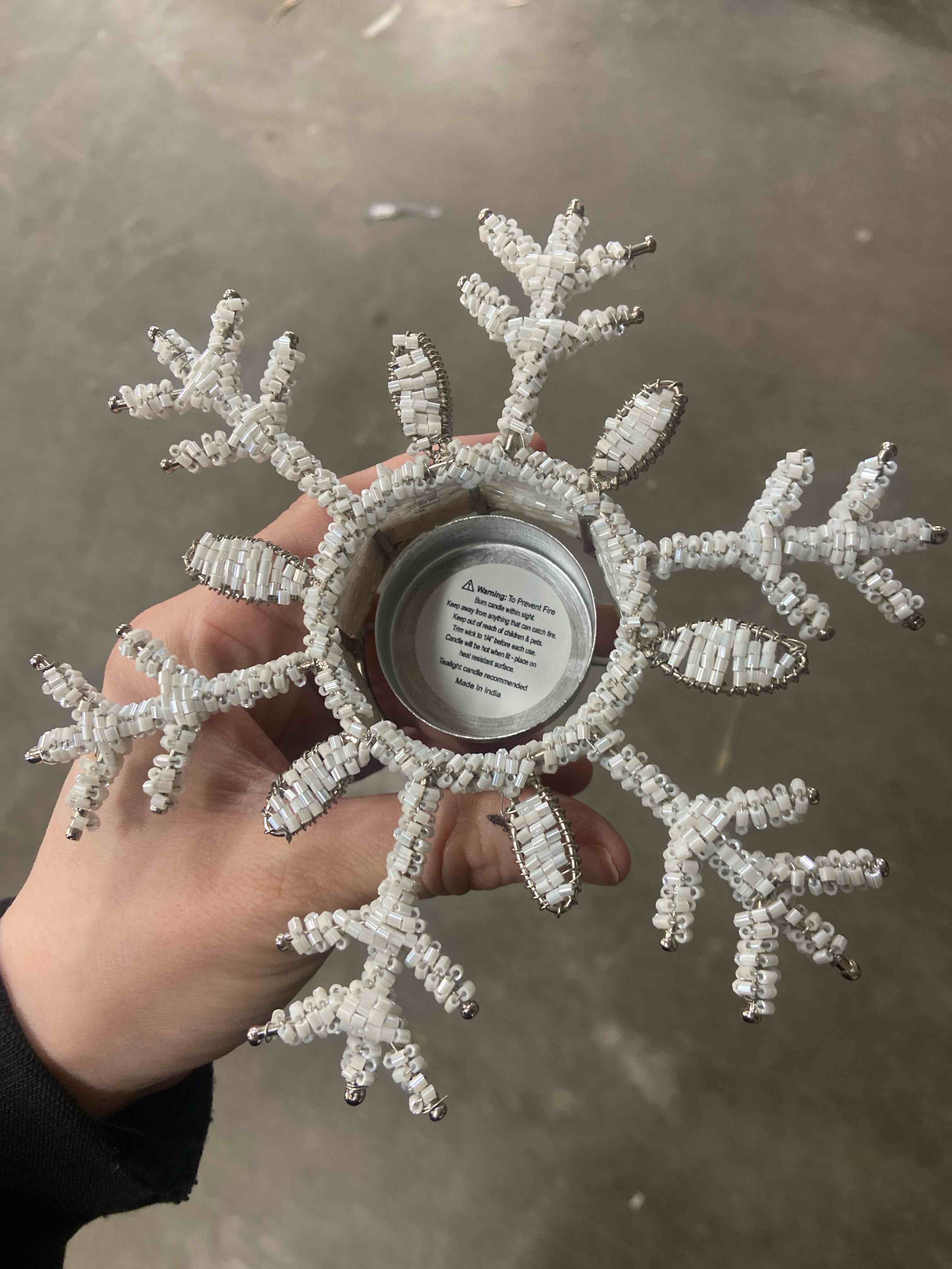 Condition photo showing New/Like New for creative co-op l x 6-1/4"w x 1-1/4"h glass bead snowflake tealight holder, white metal ornaments, multi