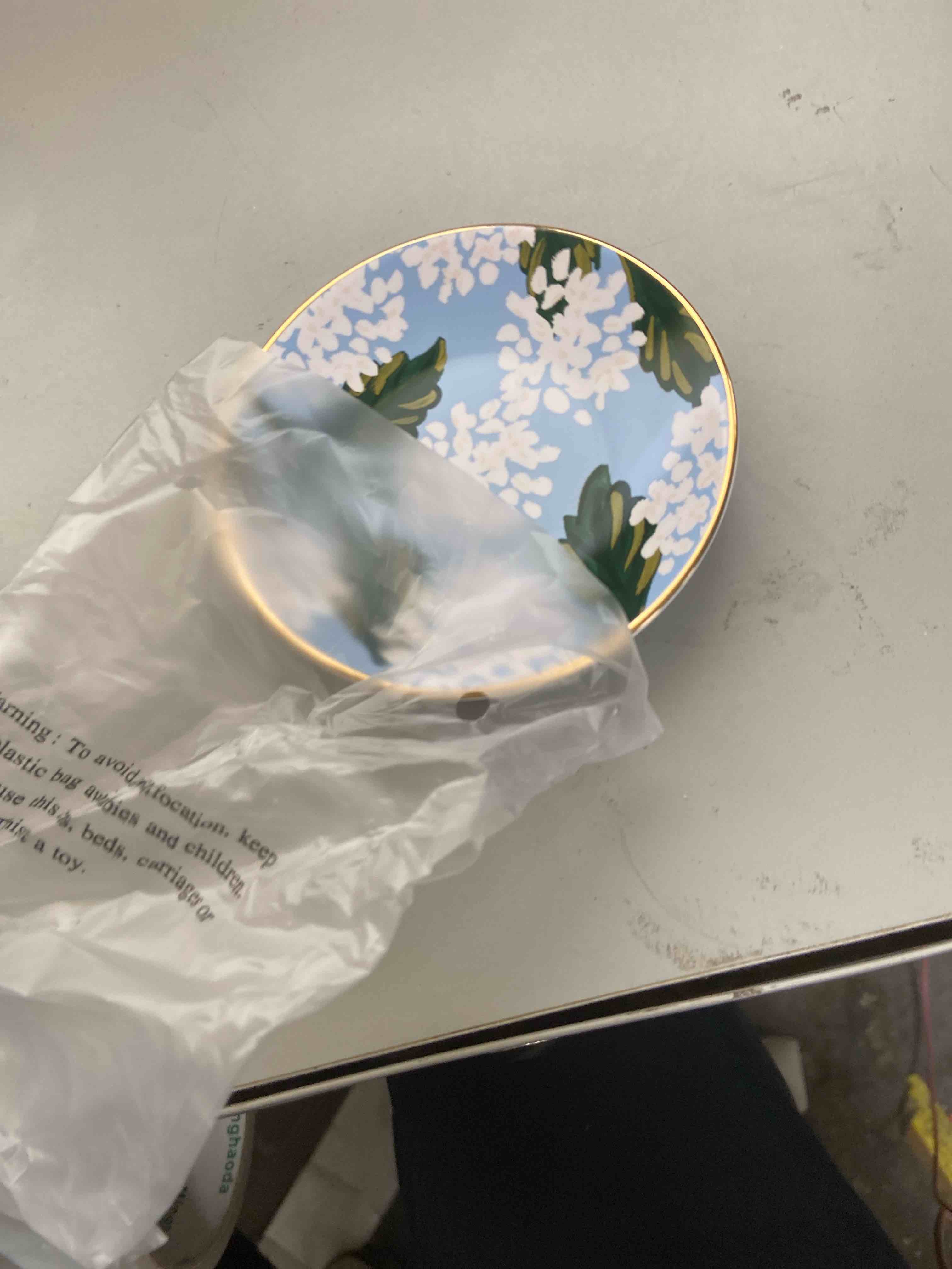 Condition photo showing New/Like New for rifle paper co. hydrangea ring dish, protect your trinkets and jewelry, minimize loss, organize desk, small item security, keep valuables safe and visible, cute and fashionable