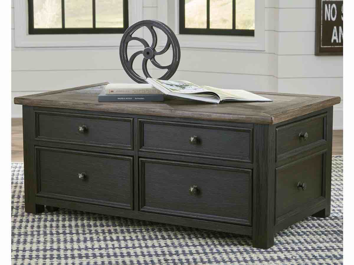 Tyler Creek Coffee Table with Lift Top. Bottom Left drawer needs fixed as well as left side drawer. 46"W x 26"D x 19.5"H