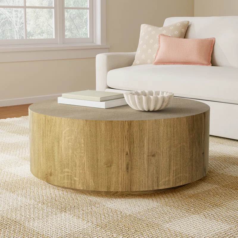 Taryn 42" Drum Coffee Table in Walnut. 17'' H X 42'' W X 42'' D