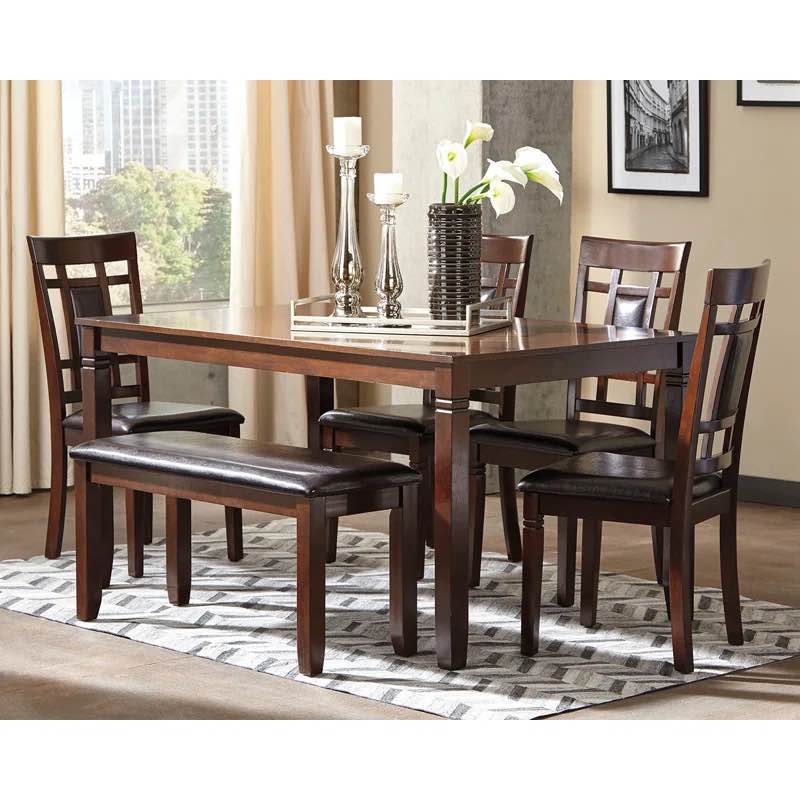 Signature Design by Ashley Bennox 6 Piece Solid Wood Dining Room Set, With  60” L 36” W Table, 4 18" Solid Wood Chairs, and Dining Bench with Dark Brown Vegan Leather Cushioning.