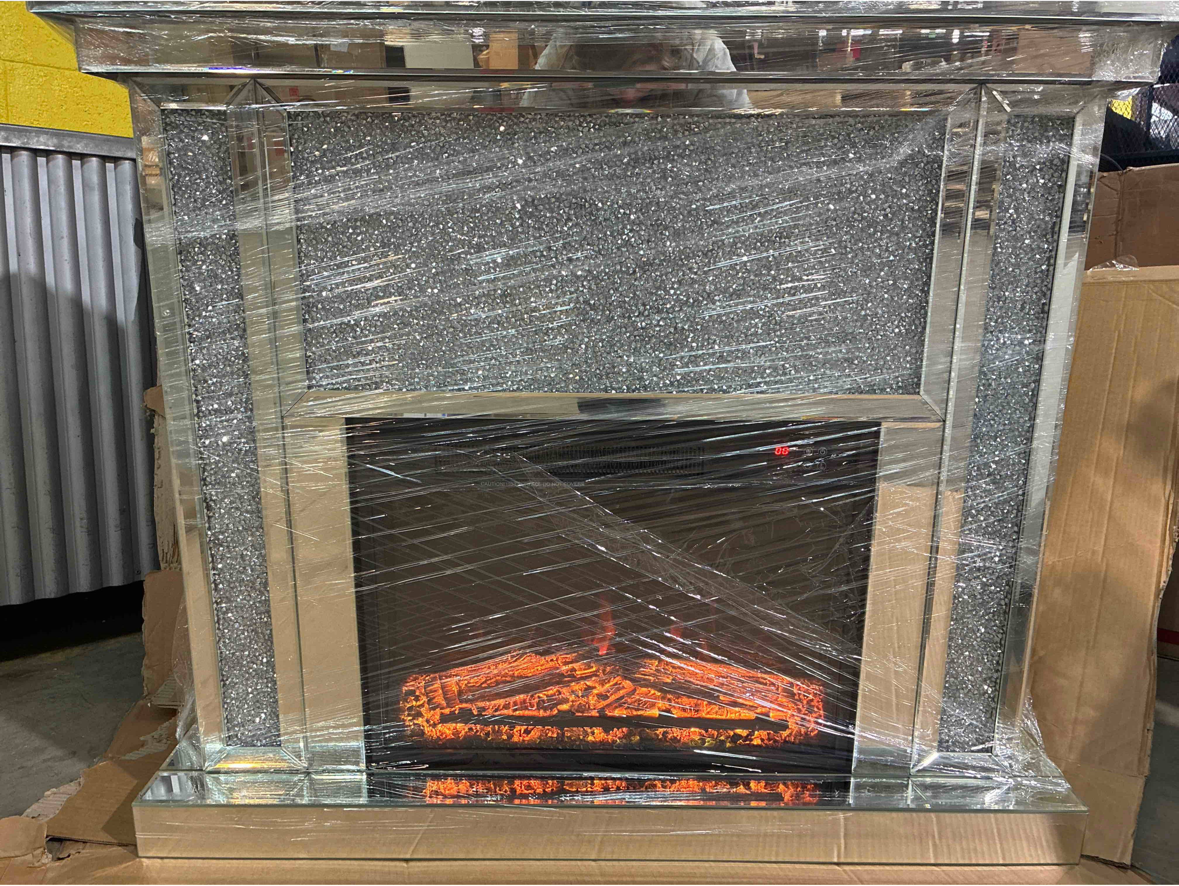 Condition photo showing New/Like New for Mercer41 Mirrored Electric Fireplace with Crystal InLays. 38.98'' H X 43.31'' W X 12.6'' D