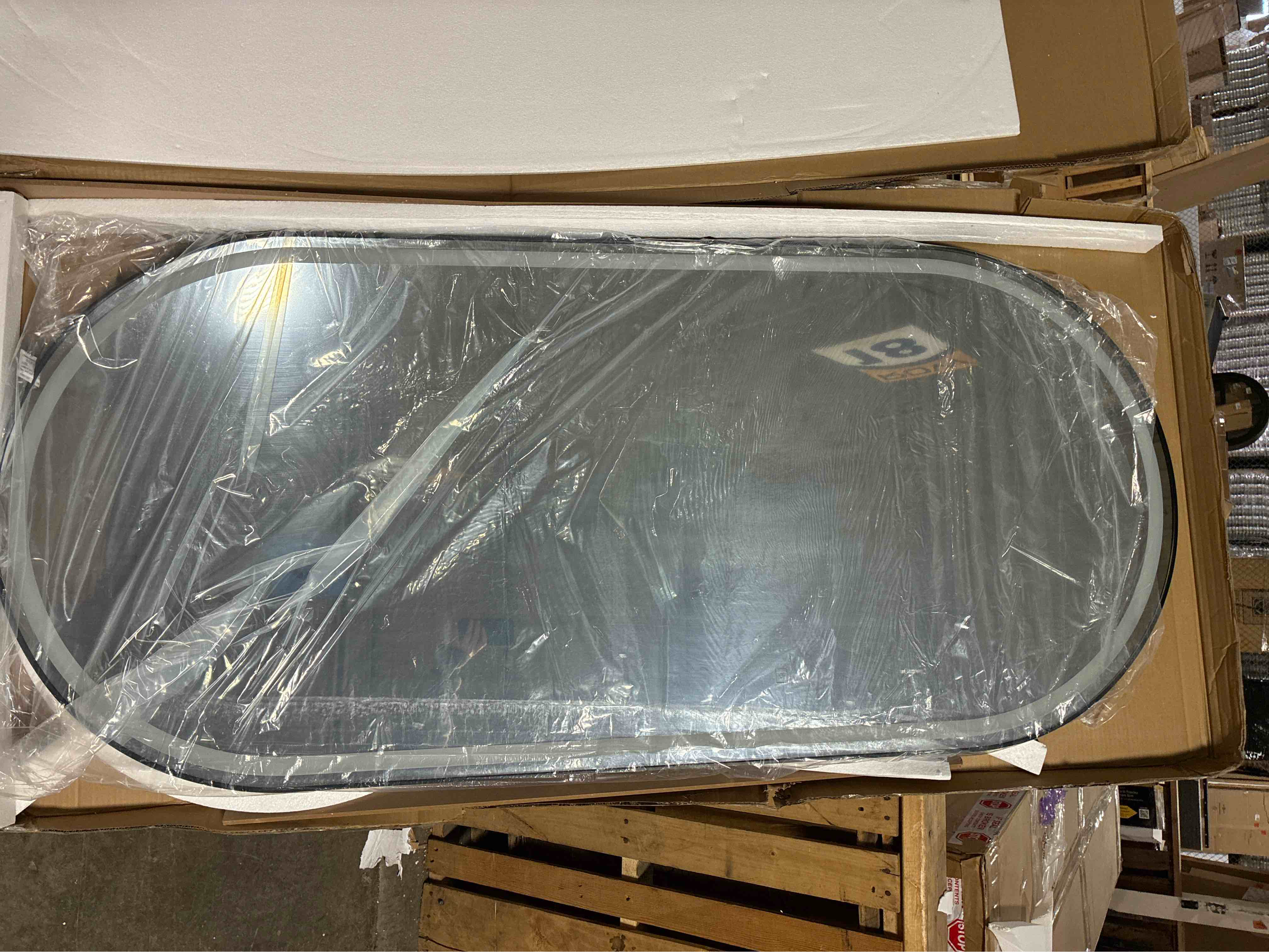 Condition photo showing Good Condition for Curved Oval LED Wall Mounted Mirror with Black Frame, 78” x 35” x 2” Thick 