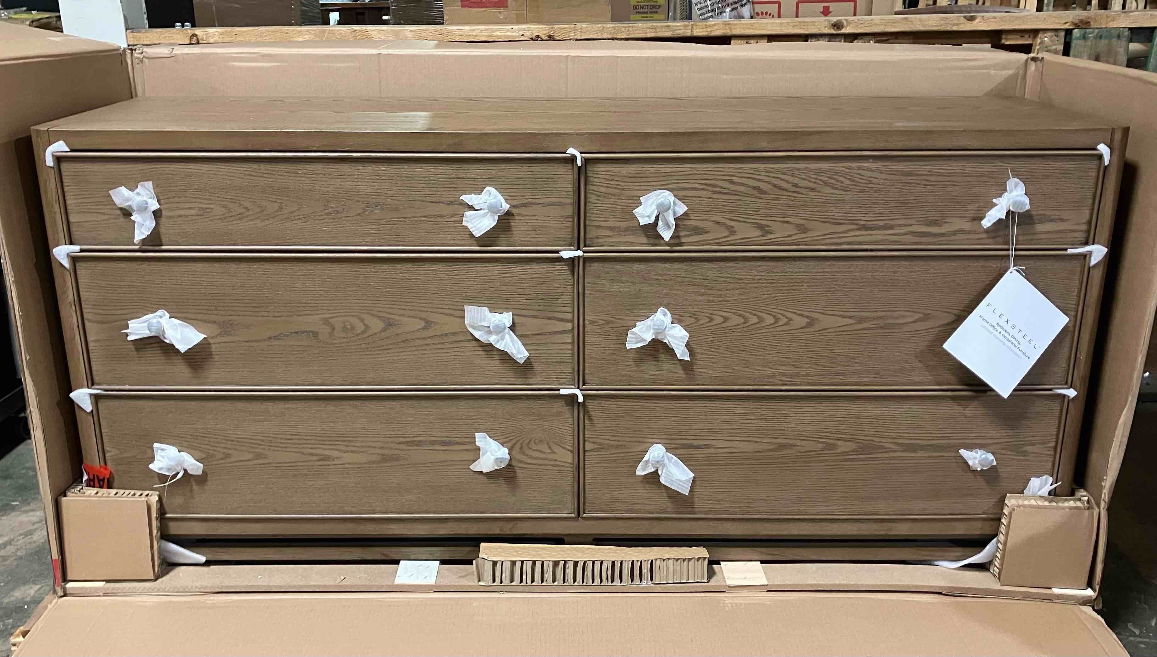 Condition photo showing New/Like New for Flexsteel® Verona Medium Brown Oak Dresser