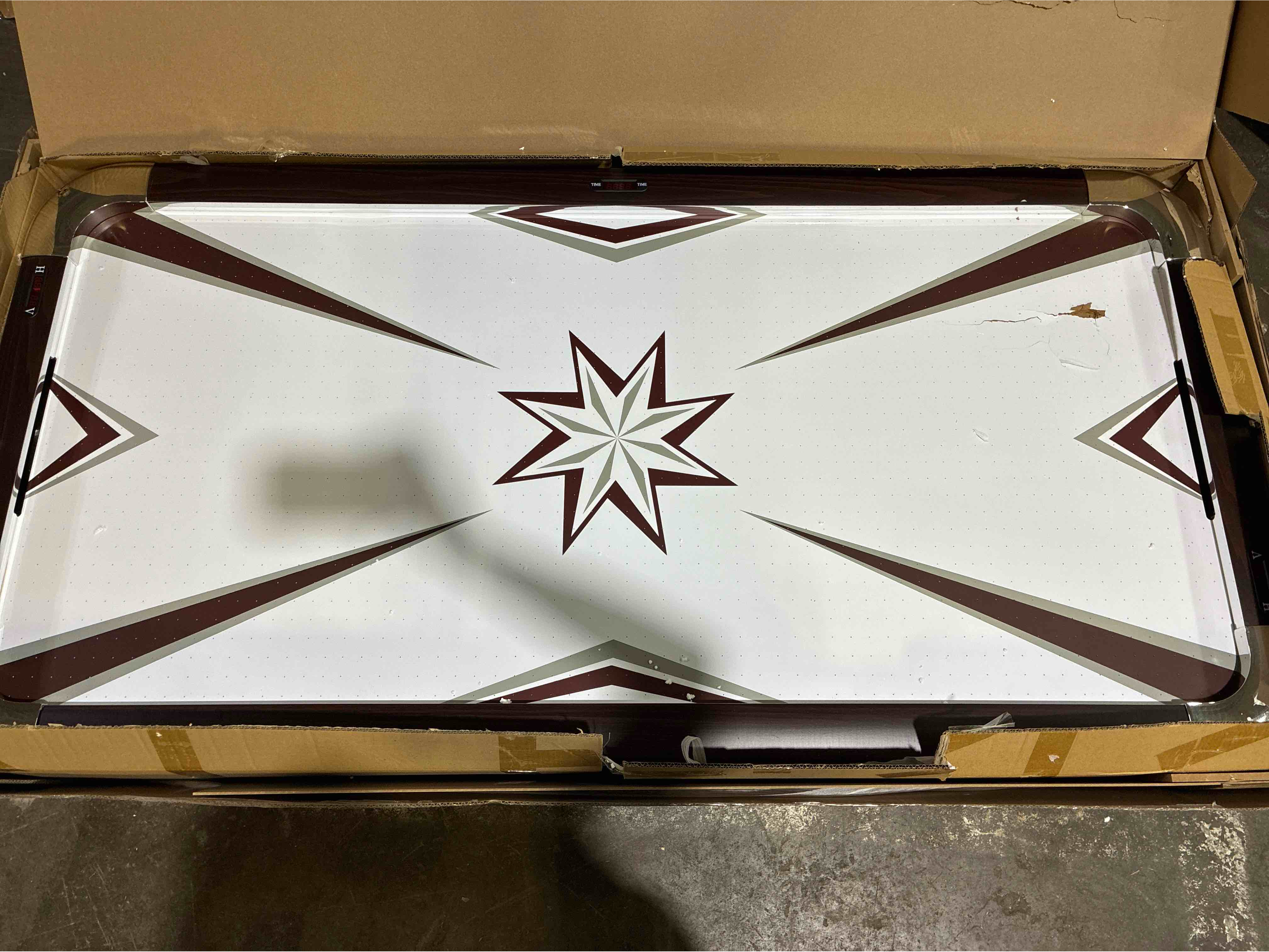 Condition photo showing As Is for Hathaway Midtown II 6-Ft Air Hockey Table with LED Score Board | Dark Cherry Frame Finish, White Game Table. Buy/Repair, right half of Table top needs repair, outer frame in beautiful condition. 36" W x 72" D x 31" H