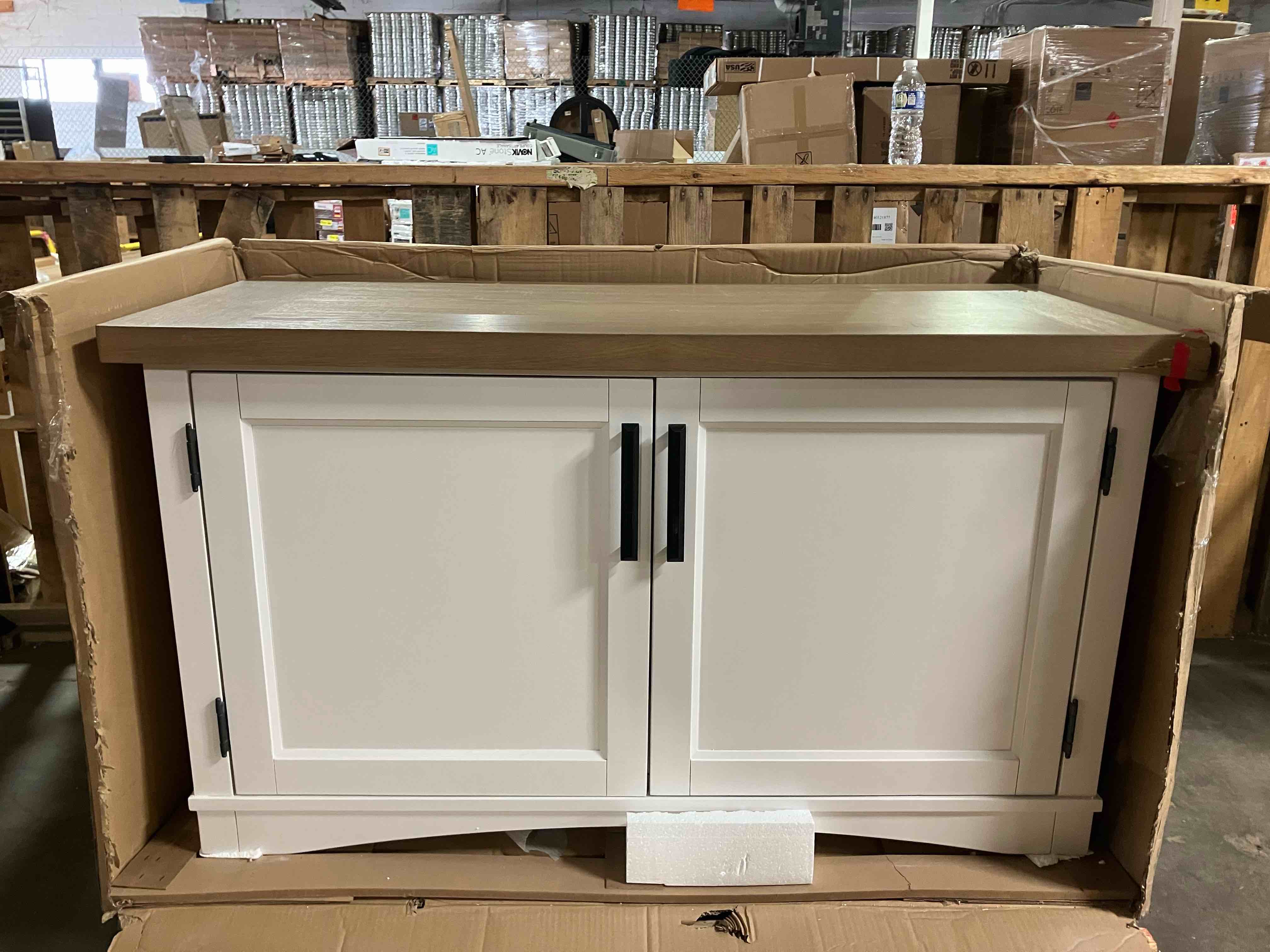 Condition photo showing As Is for Parker House Americana Modern Workstation Base in Cotton White, base only, top cabinet sold separately - (As is because of damage to wood on front right corner, pictured, and a scratch near the top left hinge, also pictured)