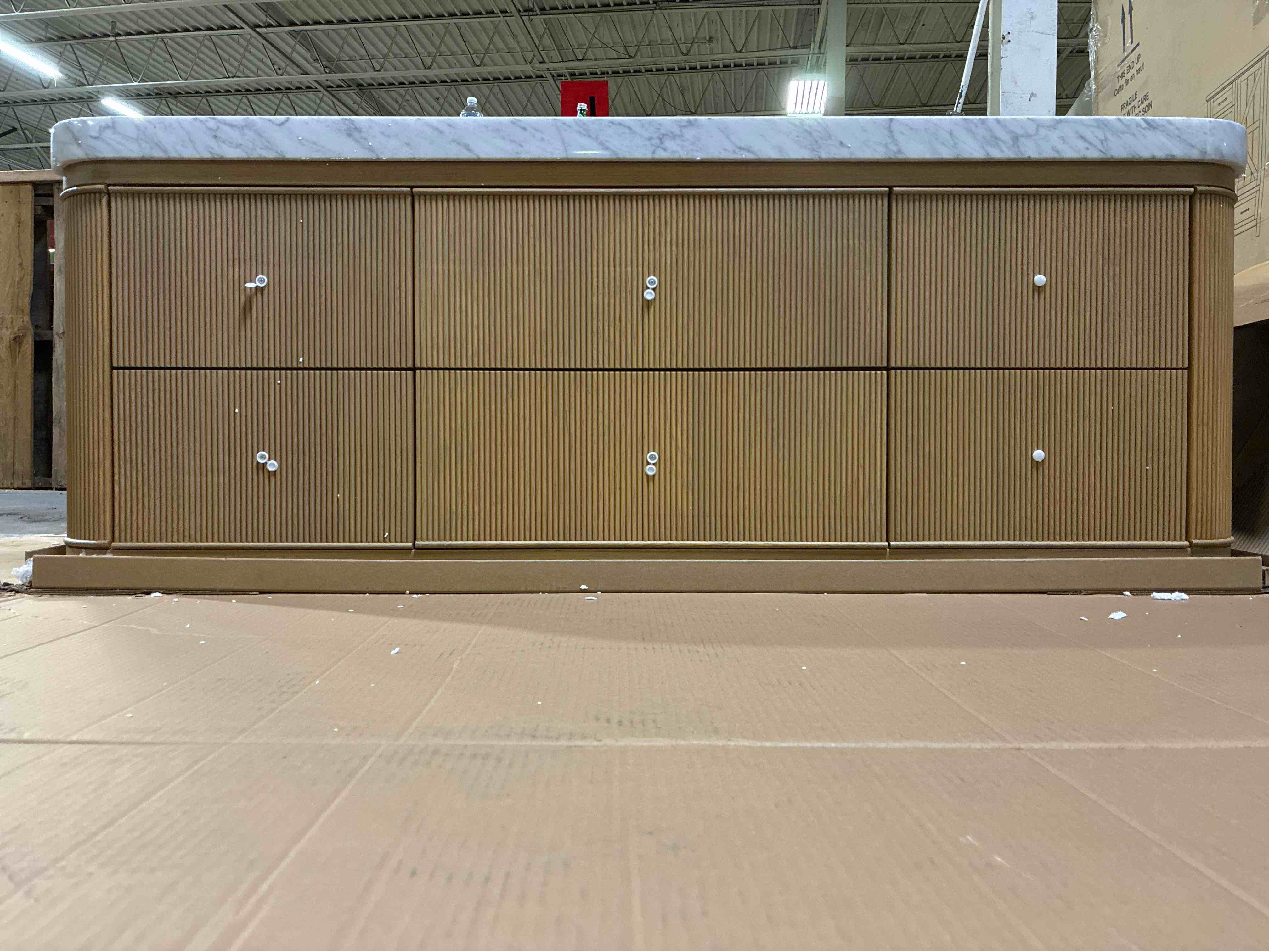 Condition photo showing New/Like New for Hampton Floating Wall Mounted Reeded Natural Oak Single Sink Bathroom Vanity with 6 Drawers, Gold Brushed Knobs, and Genuine White Calacatta Quartz Top. 60 in. W x 22 in. D