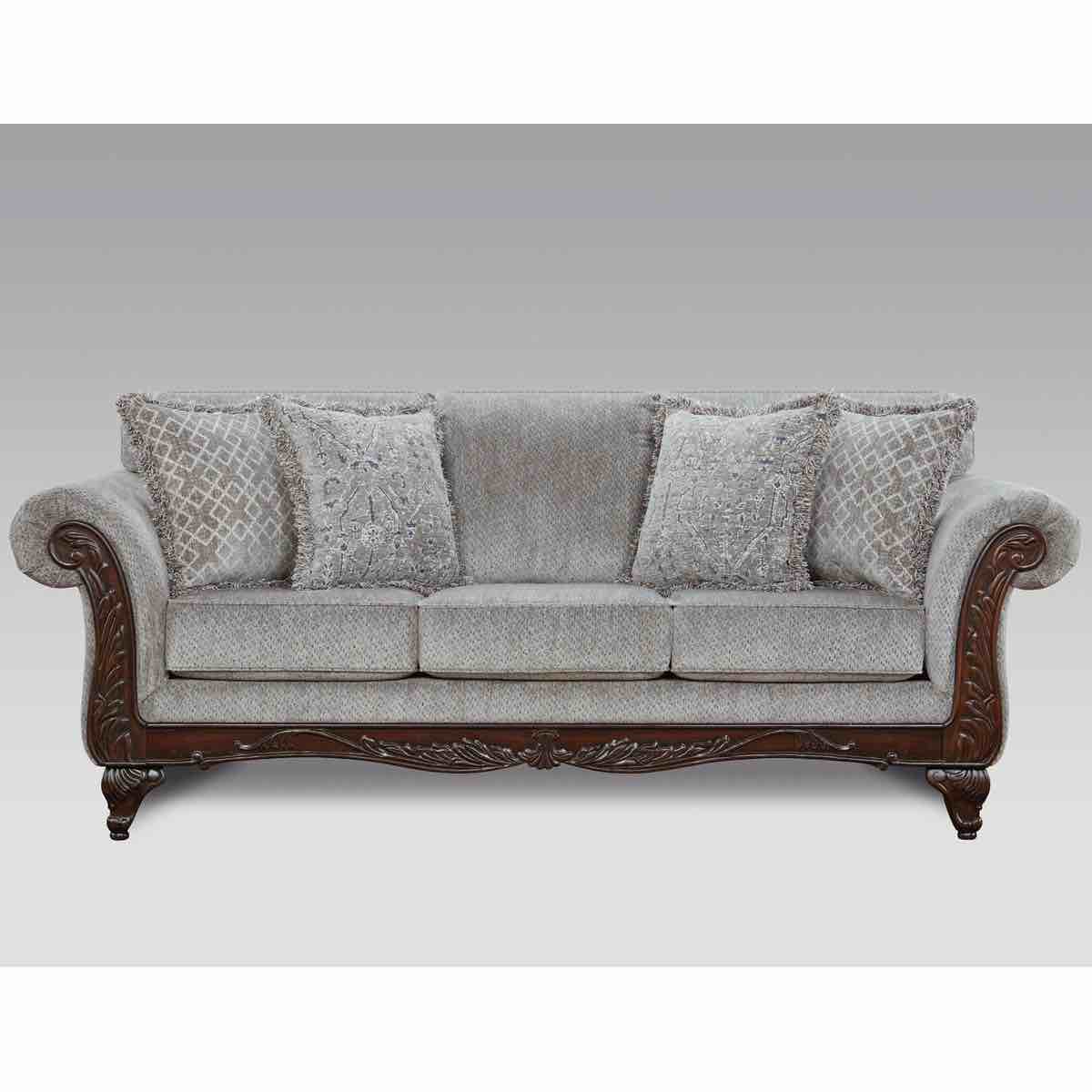 Condition photo showing Good Condition for Grey Halima Sofa with Hand Carved Wood Frame and Matching Pillows, scratches, dents, and discoloration to carved wood (pictured), loose threads on one pillow (cosmetic), 
