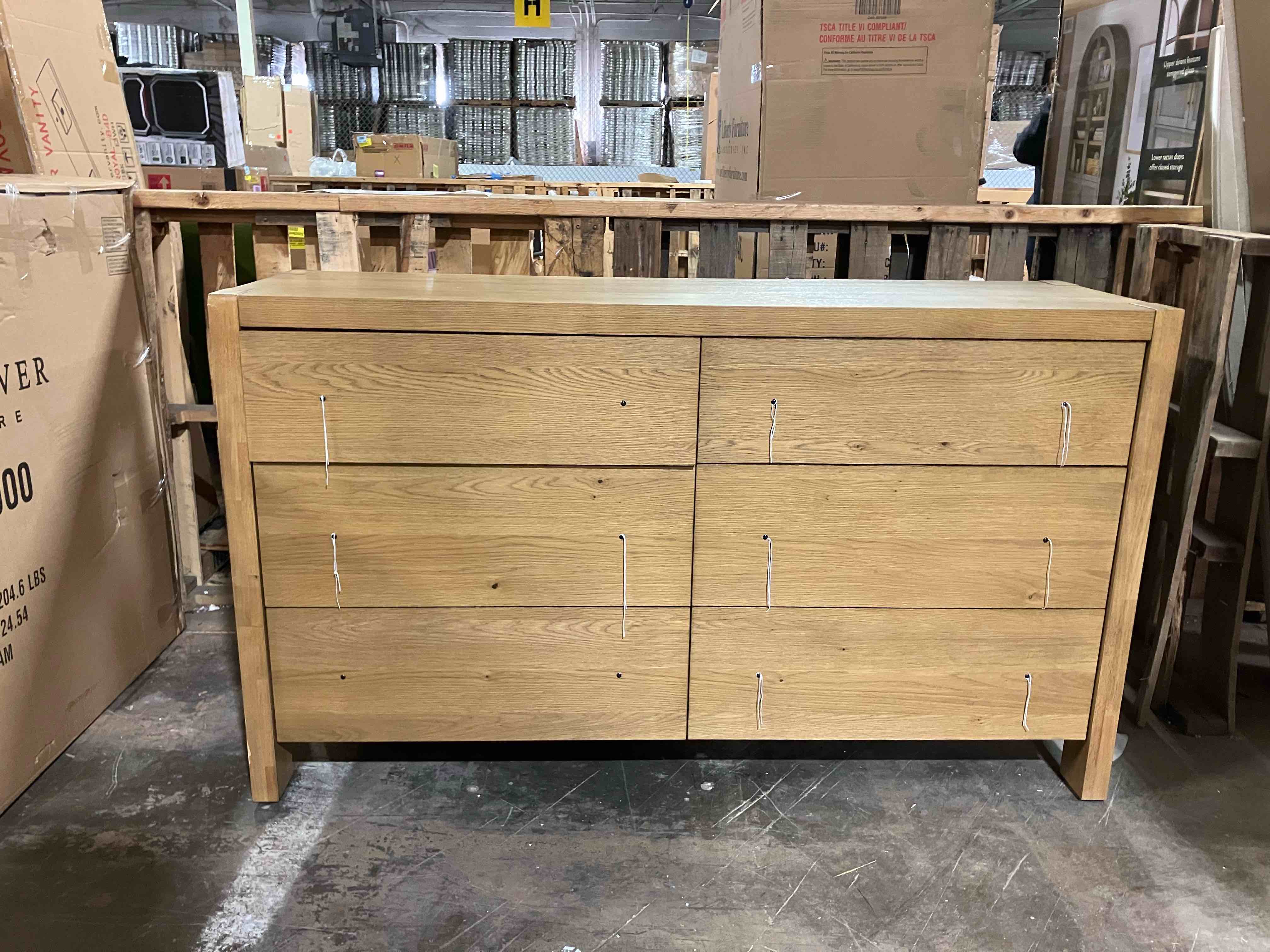 Condition photo showing Good Condition for Laroche 62'' W 6-Drawer Dresser - (Good condition bc there is damage to the left top front corner, a scrape on the left side lower edge, and the top left drawer doesn’t close all the way and needs repair, all pictured)
