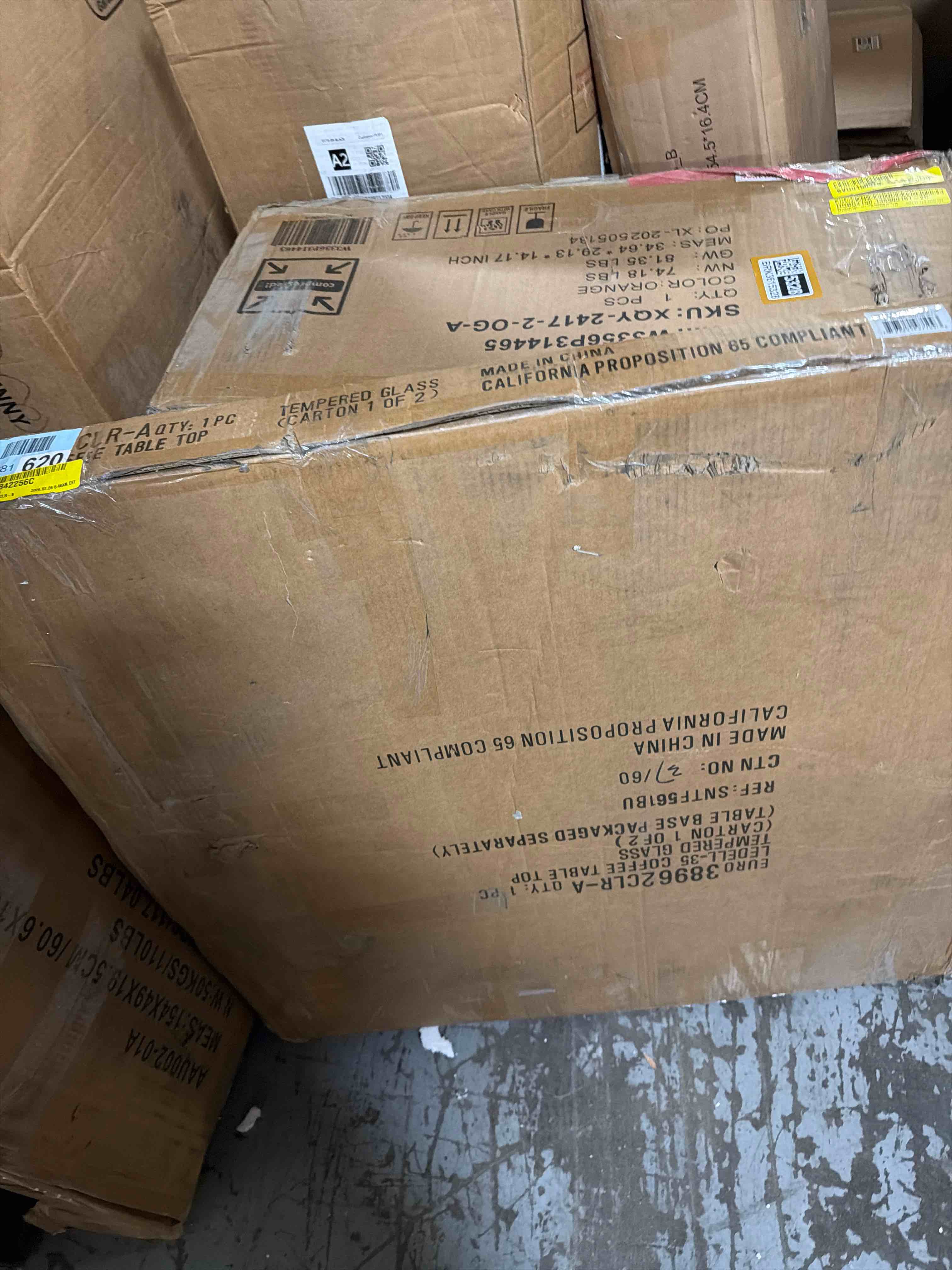 Condition photo showing As Is for Etna Glass Top Coffee Table