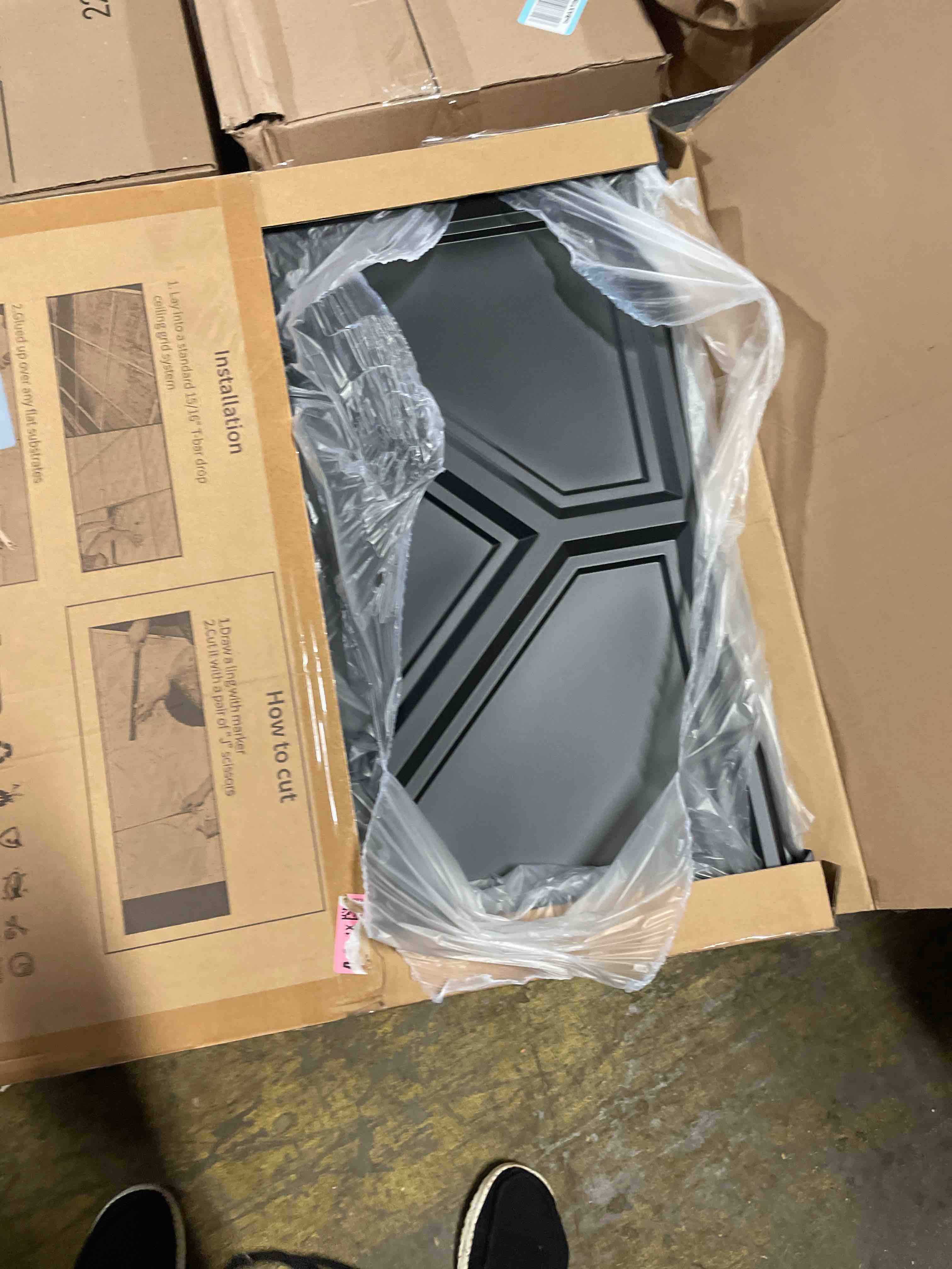 Condition photo showing New/Like New for WOWSTAR 12-Pack 24"x24" Drop Ceiling Tiles, 3D Decorative Glue Up Ceiling Tiles, Black