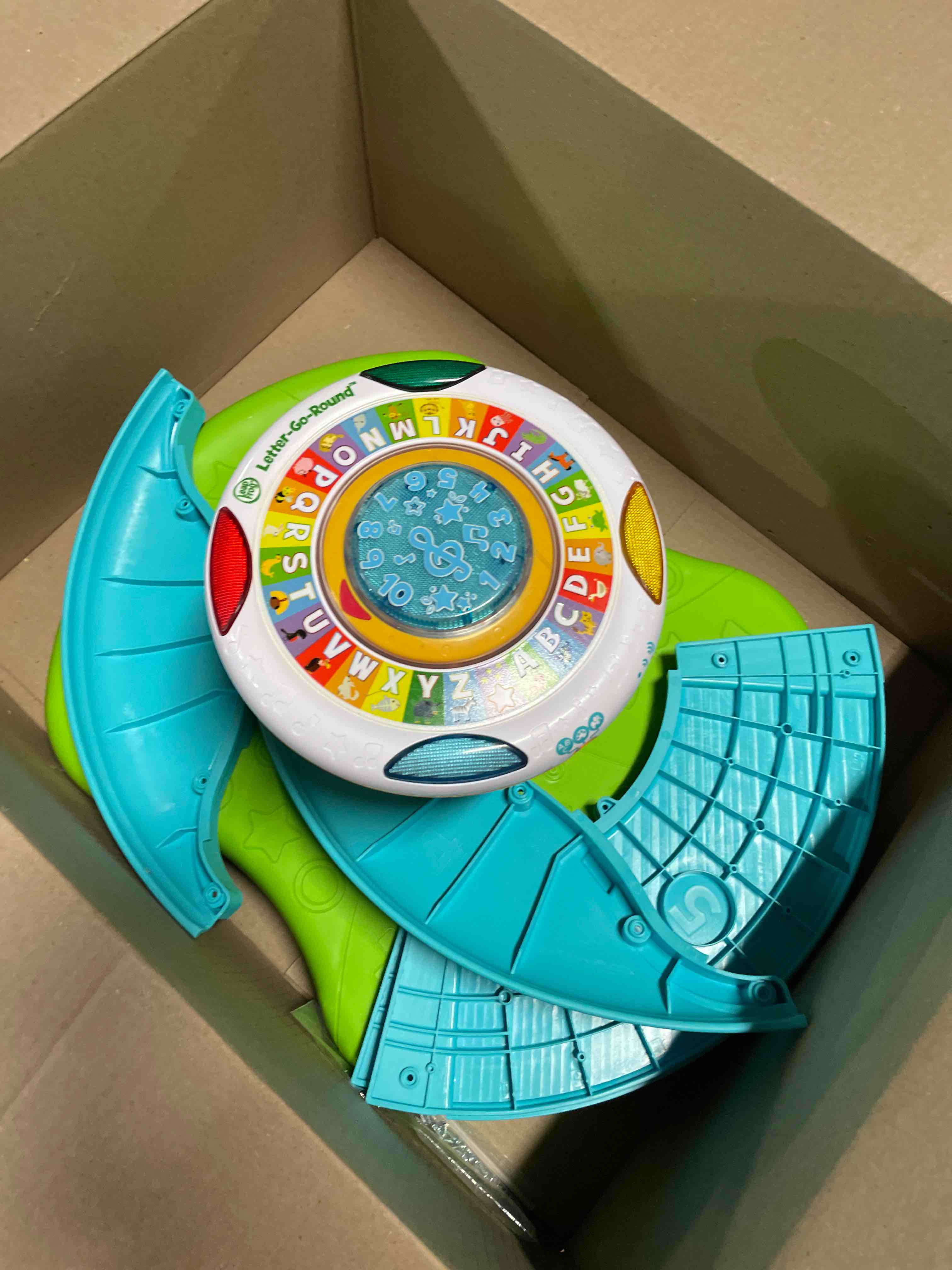 Condition photo showing As Is for LeapFrog Letter-Go-Round (Frustration Free Packaging)