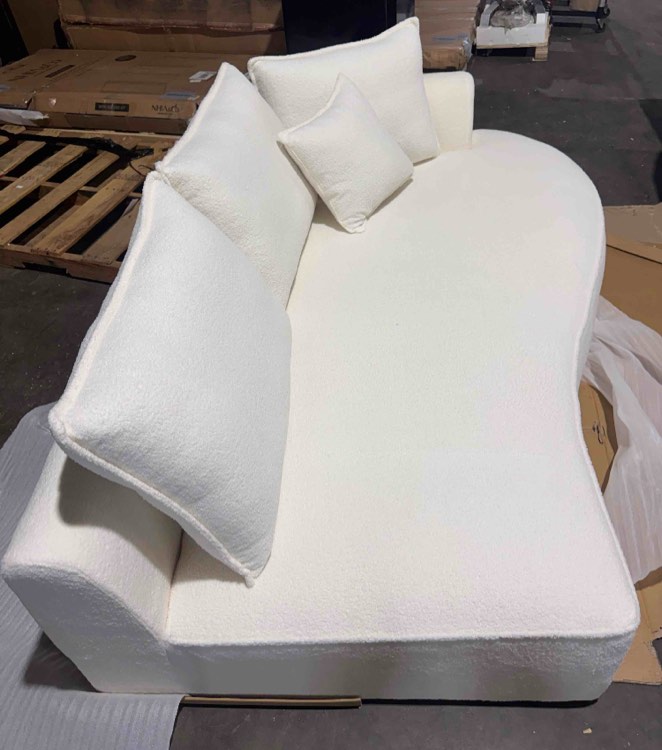 Condition photo showing New/Like New for white boucle curved chaise sofa (see lot photos for exact item) 42 x 79 x 22