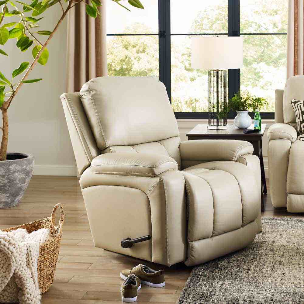 Condition photo showing New/Like New for beige greyson rocking recliner with wooden handle. 38.5w x 41d x 43h