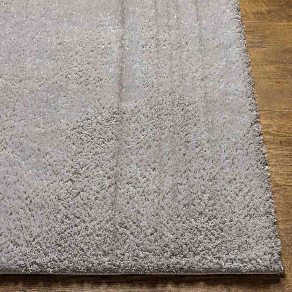 Condition photo showing New/Like New for livabliss cloudy solid plush area rug -( 7' 10" x 10')- medium grey