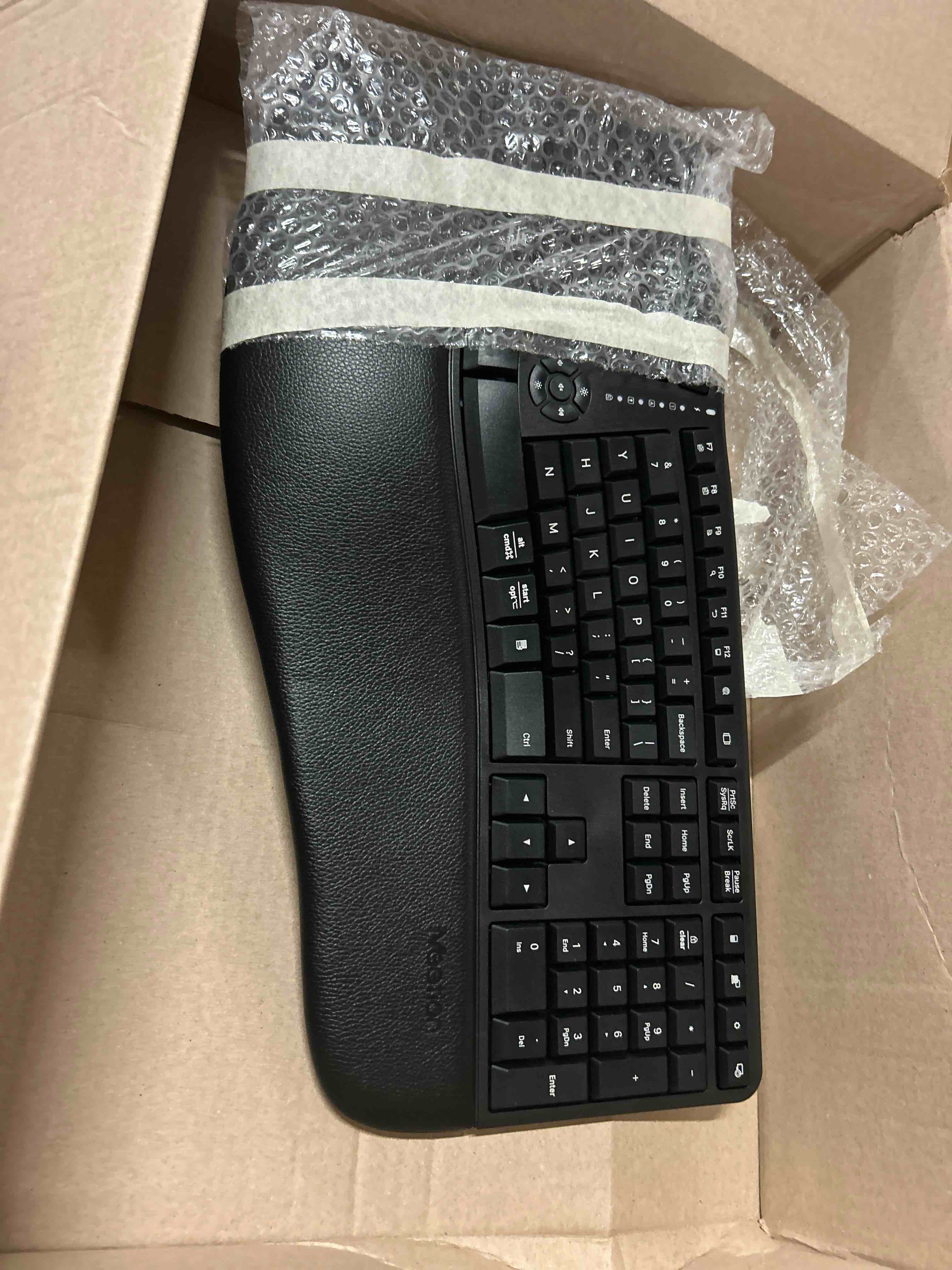 Condition photo showing New/Like New for meetion ergonomic keyboard wireless, split curved keyboard with cushioned soft wrist palm rest, 2.4ghz cordless computer keybaords, full size natural typing for windows/mac/laptop/pc, black
