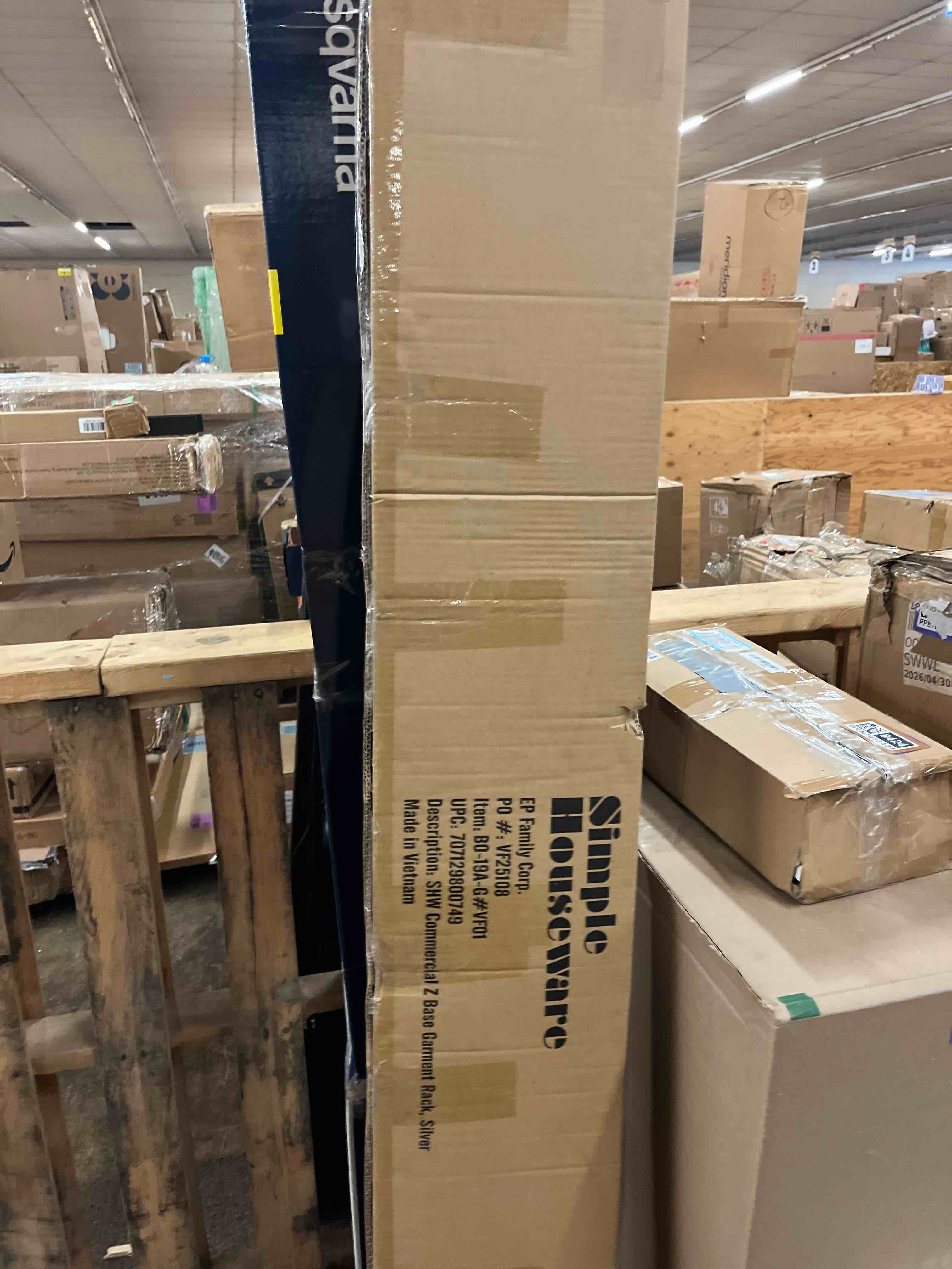 Condition photo showing New/Like New for simple houseware industrial grade z-base garment rack  400lb load with 62 inch extra long bar  silver