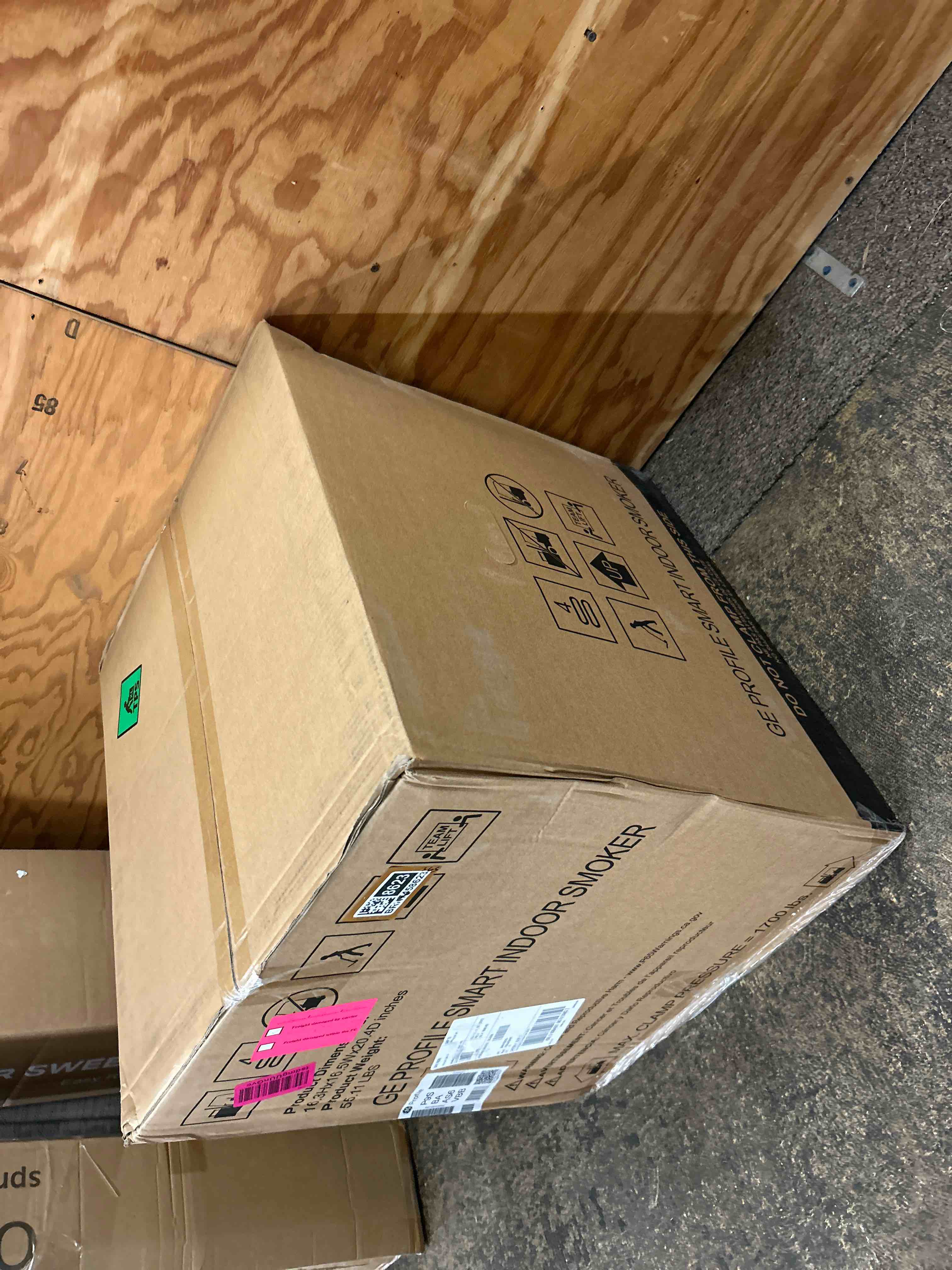 Condition photo showing New/Like New for ge profile smart indoor pellet smoker, with active smoke filtration, 5 smoke control settings, wifi connected, electric, countertop bbq appliance, black
