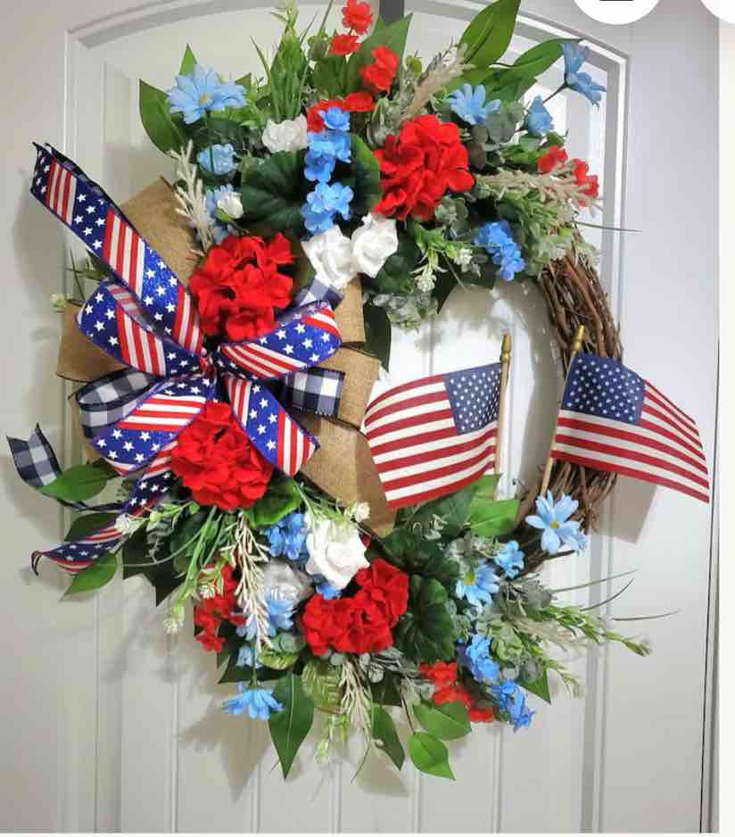 Condition photo showing New/Like New for geranium wreath, patriotic wreath, independence wreath, memorial day wreath, 4th of july wreath, flag wreath, americana geranium wreath