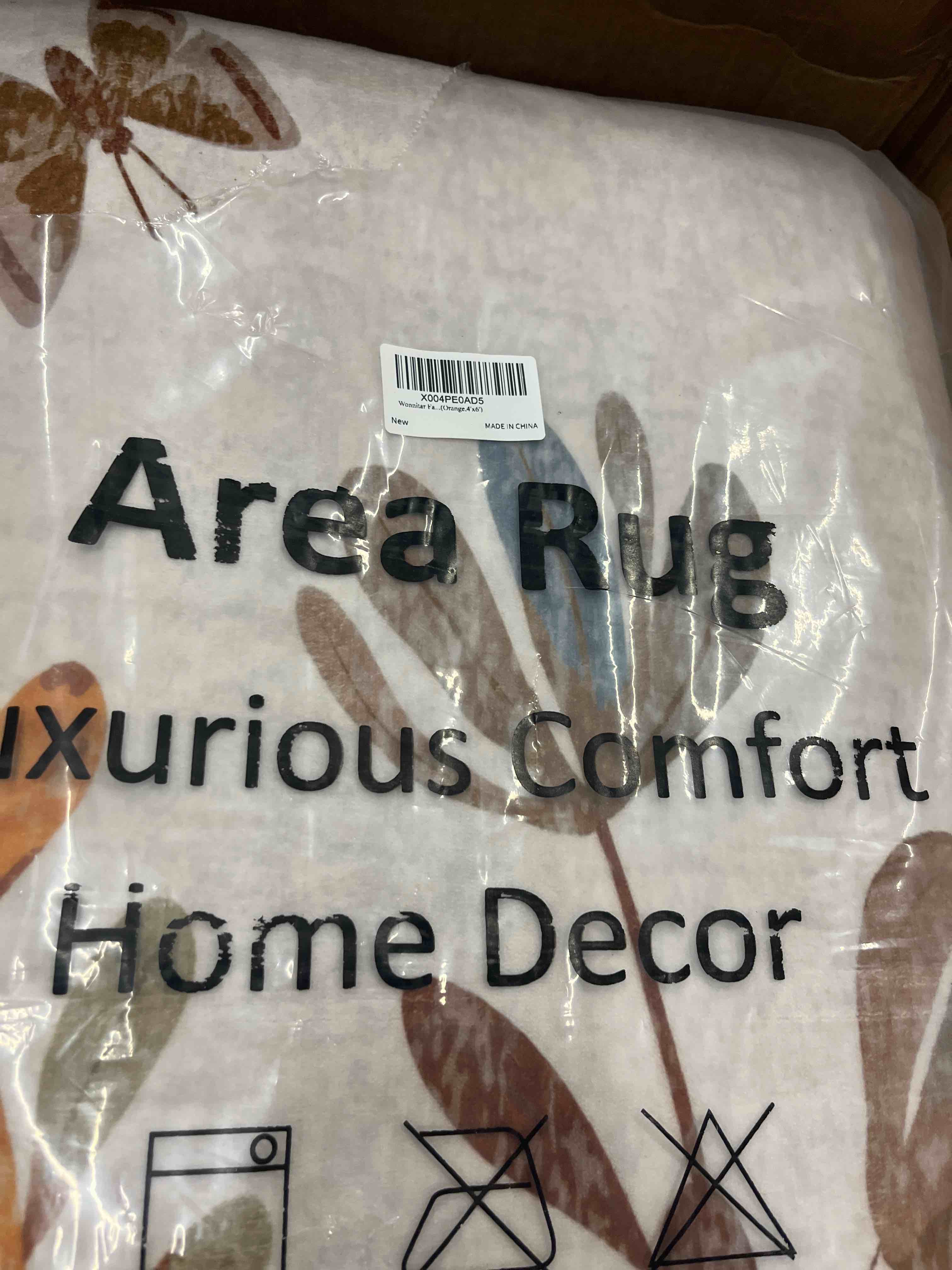 Condition photo showing New/Like New for wonnitar 8x10 feet washable area rug, burnt orange floral rug for living room, boho large botanical bedroom carpet, non slip nursery rug, farmhouse dining room decor (8x10 orange)