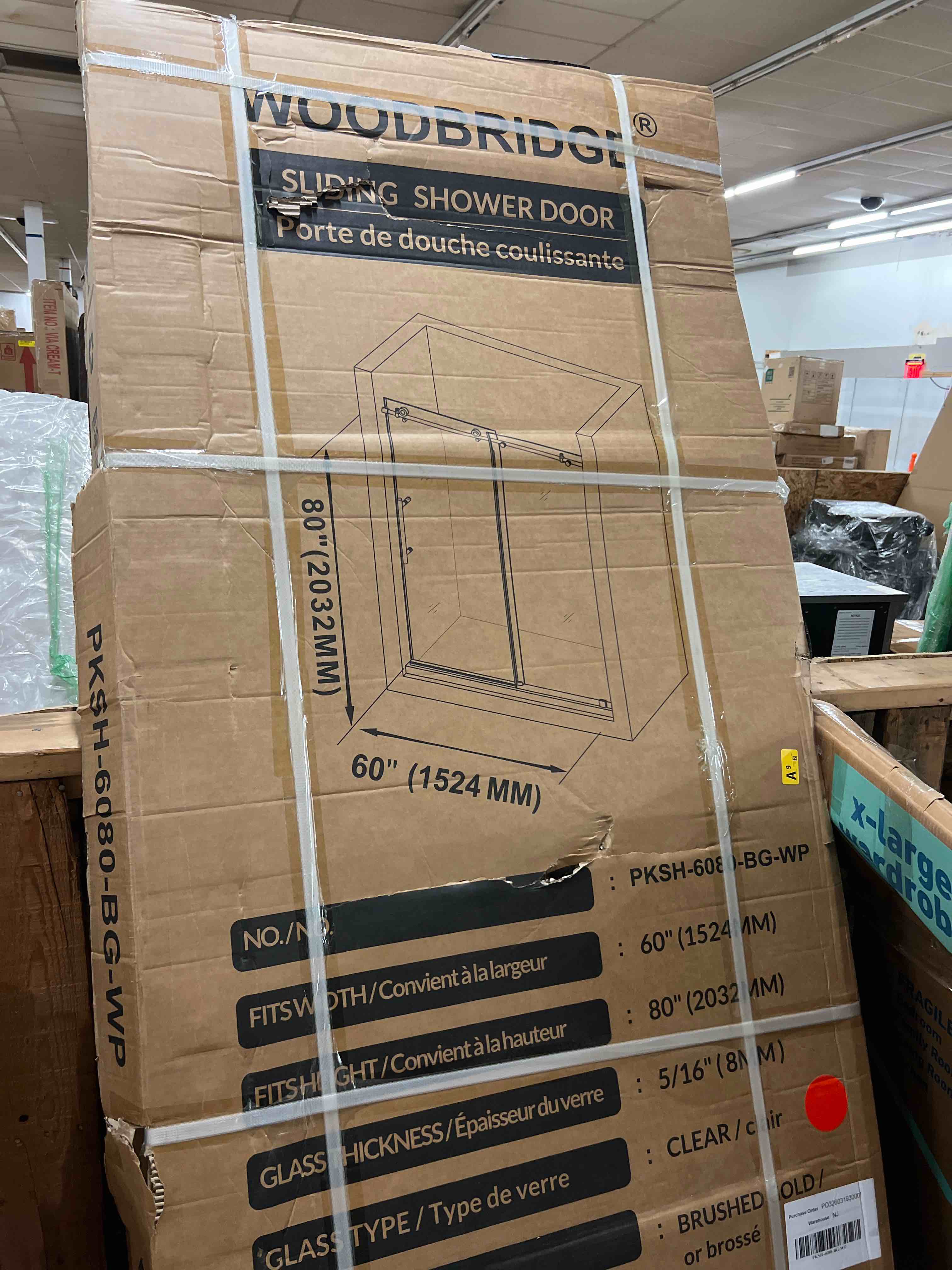 Condition photo showing New/Like New for woodbridge 57.5-60" w x 80" h frameless single sliding soft-close shower door with tempered glass & explosion proof film in brushed gold finish