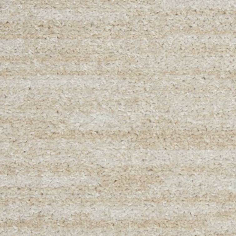 Condition photo showing New/Like New for Mullican Sandy Solid Ivory/Beige Easy Care Indoor/Outdoor Area Rug (8 x 10ft)
