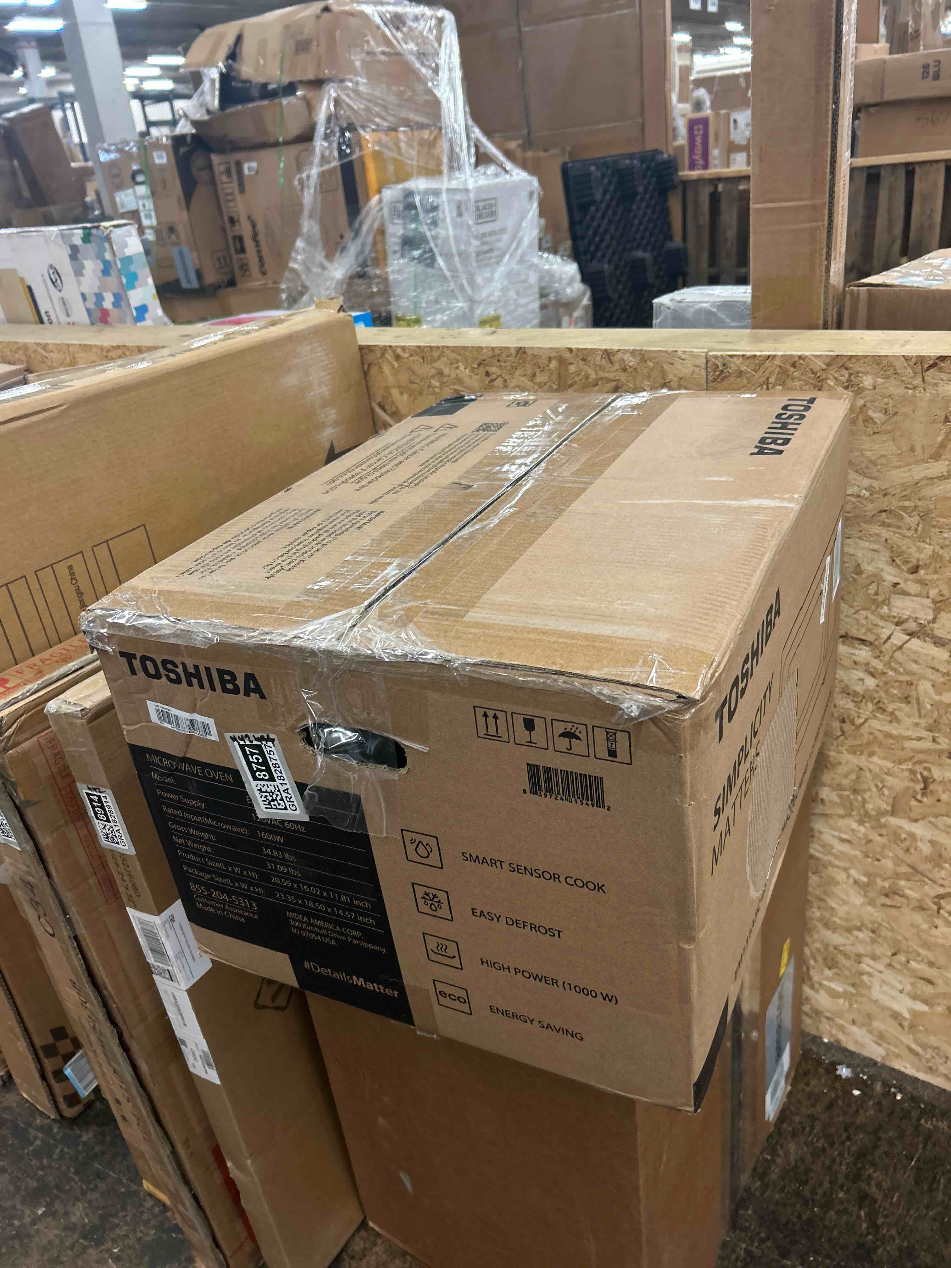 Condition photo showing New/Like New for TOSHIBA EM131A5C-BS Countertop Microwave Ovens 1.2 Cu Ft, 12.4" Removable Turntable Smart Humidity Sensor 12 Auto Menus Mute Function ECO Mode Easy Clean Interior Black Color 1000W