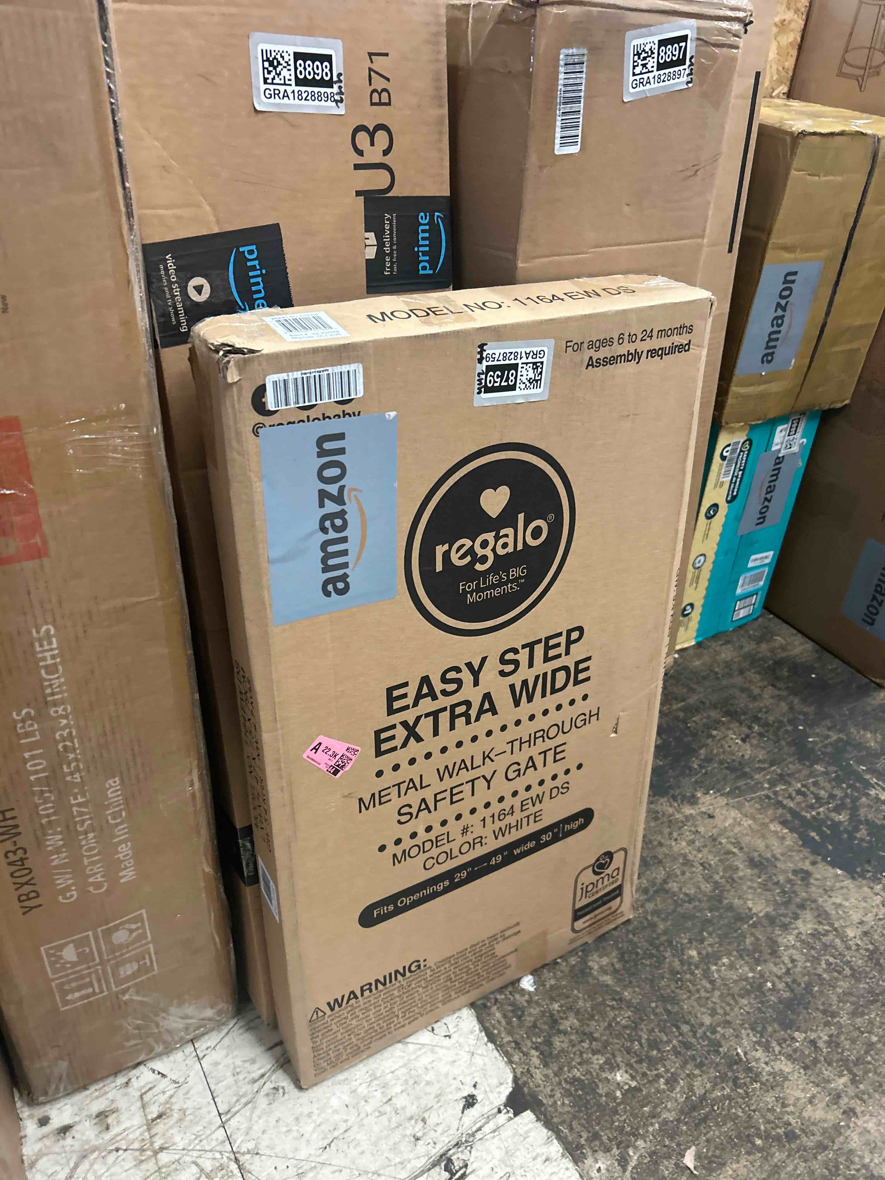 Condition photo showing New/Like New for Regalo Easy Step 49-Inch Extra Wide Baby Gate, Includes 4-Inch and 12-Inch Extension Kit, 4 Pack of Pressure Mount Kit and 4 Pack of Wall Mount Kit
