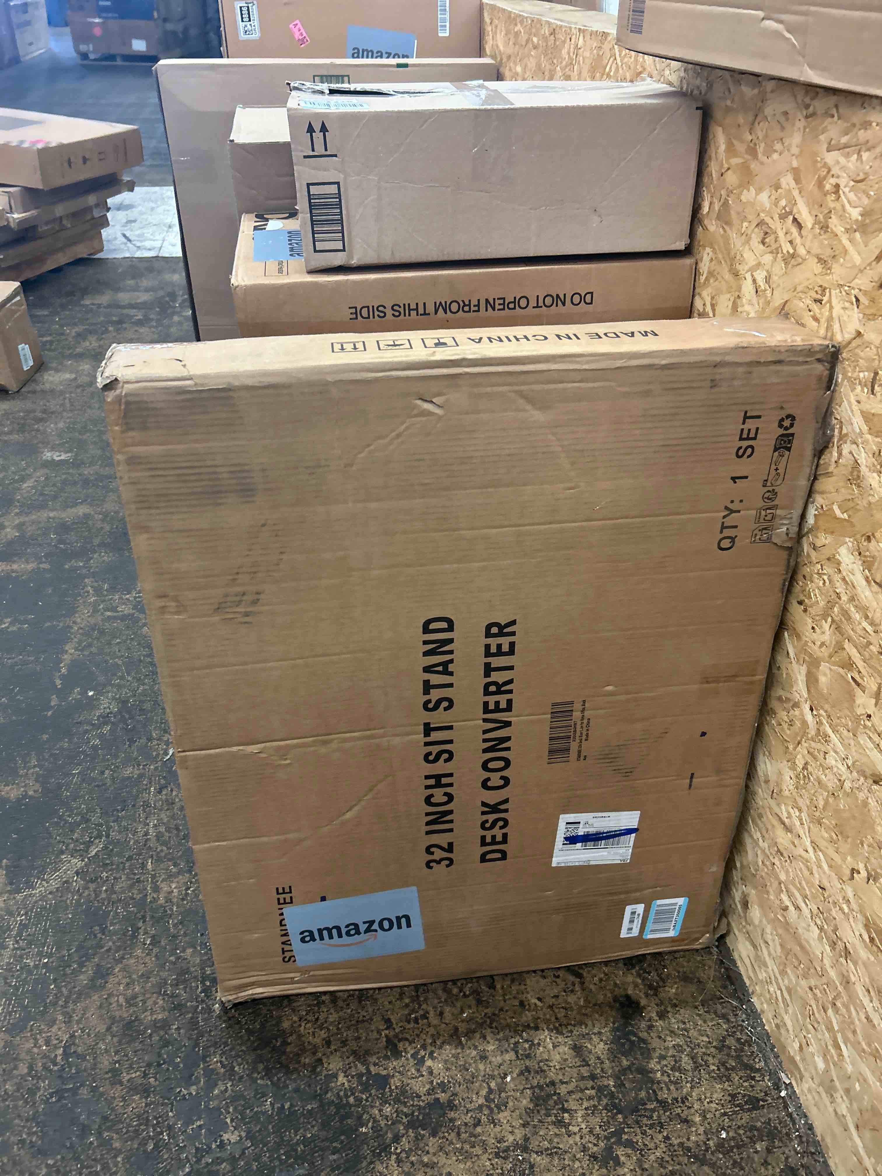 Condition photo showing New/Like New for 32in Desk Riser for Standing or Sitting, Large Standing Desk Converter, Height Adjustable Sit Stand Desk Converter, Fully Assembled Monitor Laptop Riser Workstation for Home Office, Black