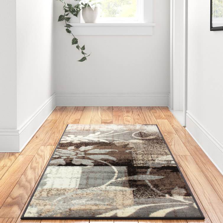 Aracelie Geometric Patchwork Floral Area Rug in Camel (2’ 7” x 8’)