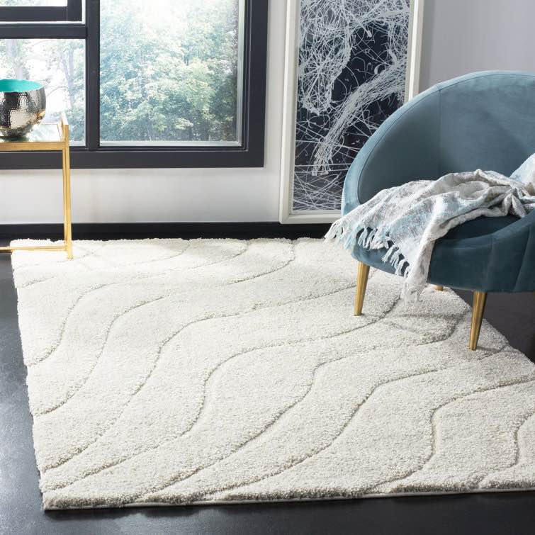 ashal abstract cream area rug (4' x 6')