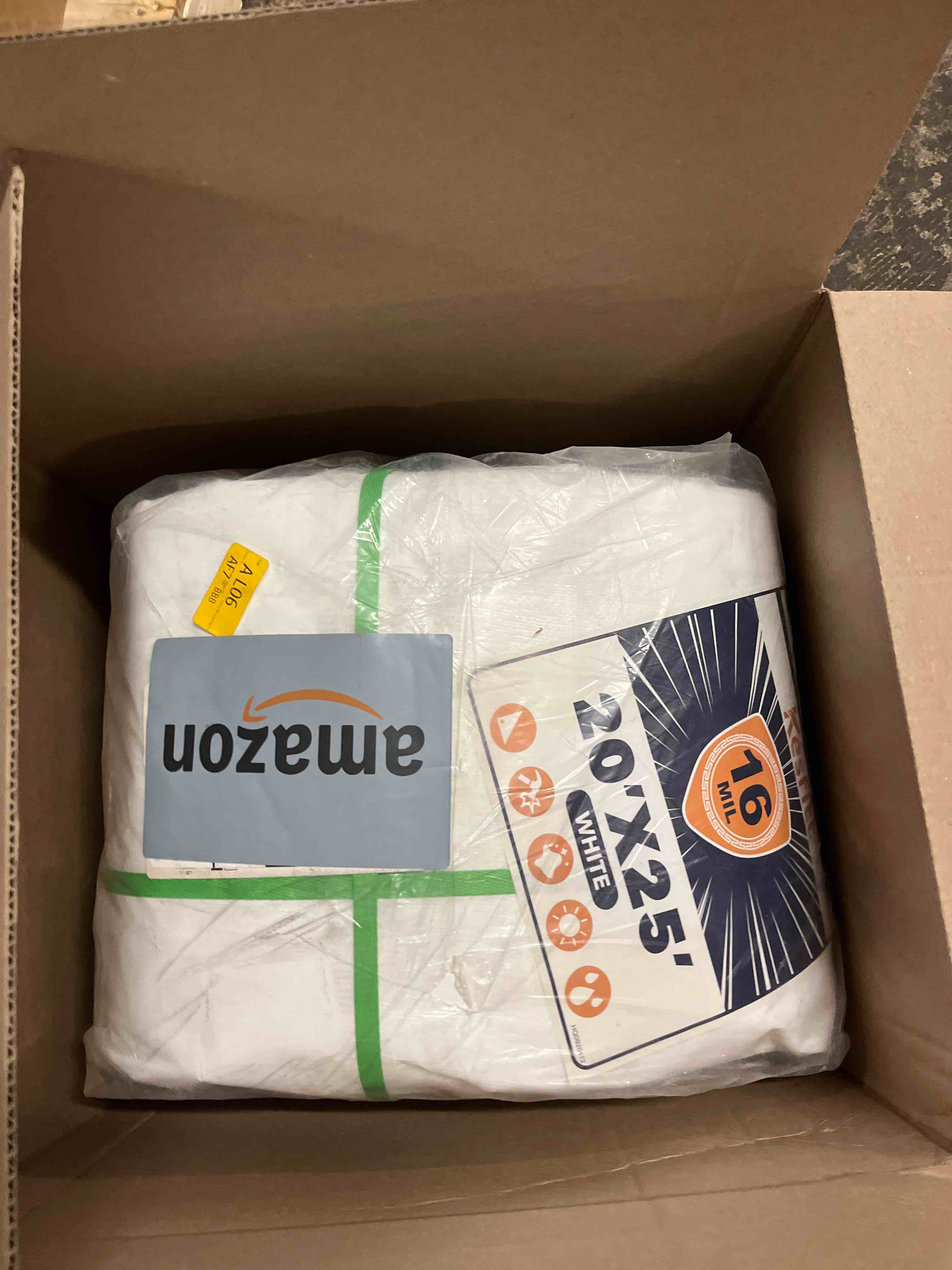 Condition photo showing New/Like New for kesfitt 16 mil heavy duty waterproof white tarp, 20x25 ft, 100% virgin polyethylene, reinforced grommets, uv resistant outdoor tarp for storm protection, equipment cover & backyard use