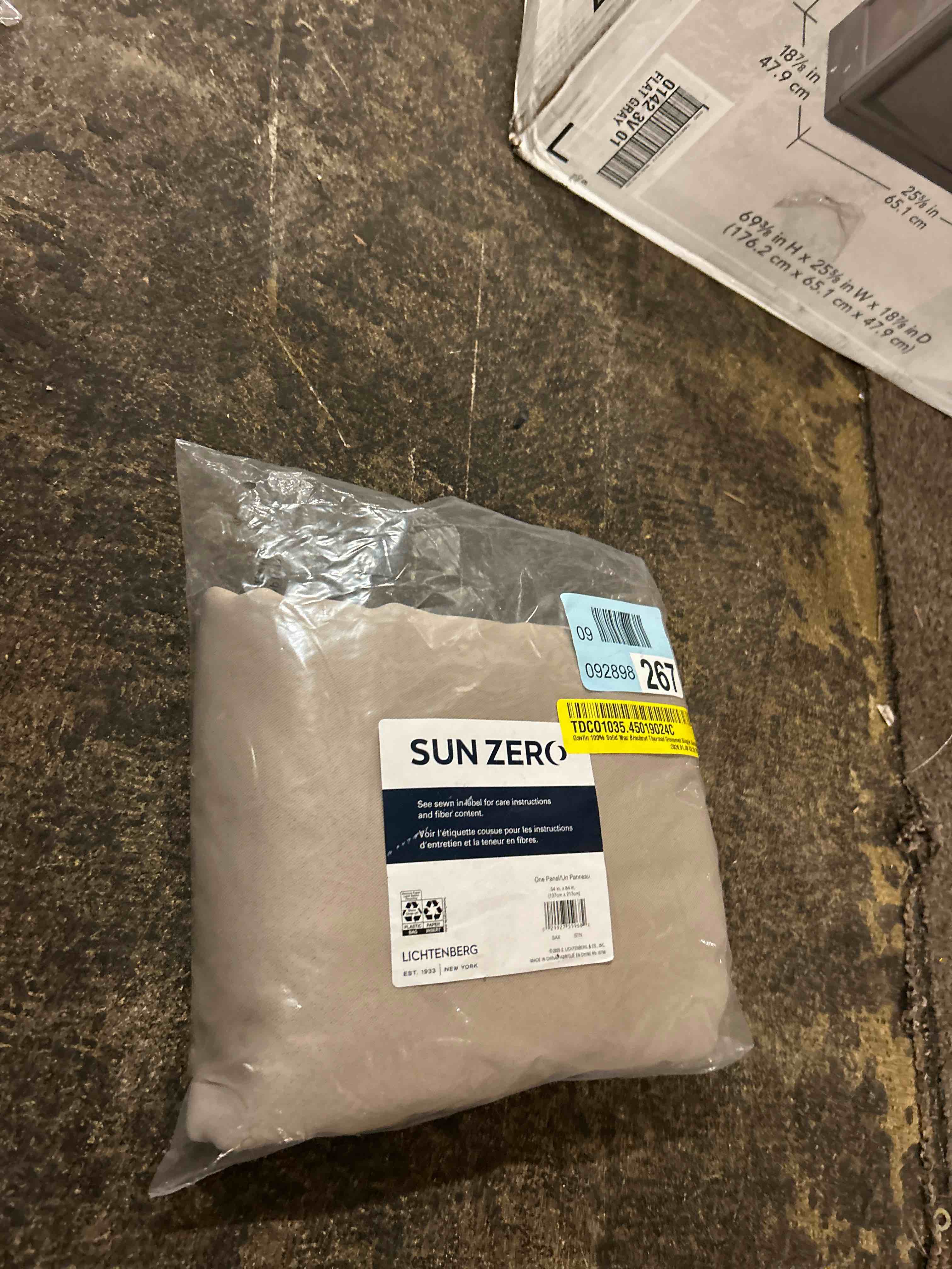 Condition photo showing New/Like New for sun zero nolan energy efficient blackout grommet single curtain panel  54  x 84   stone
