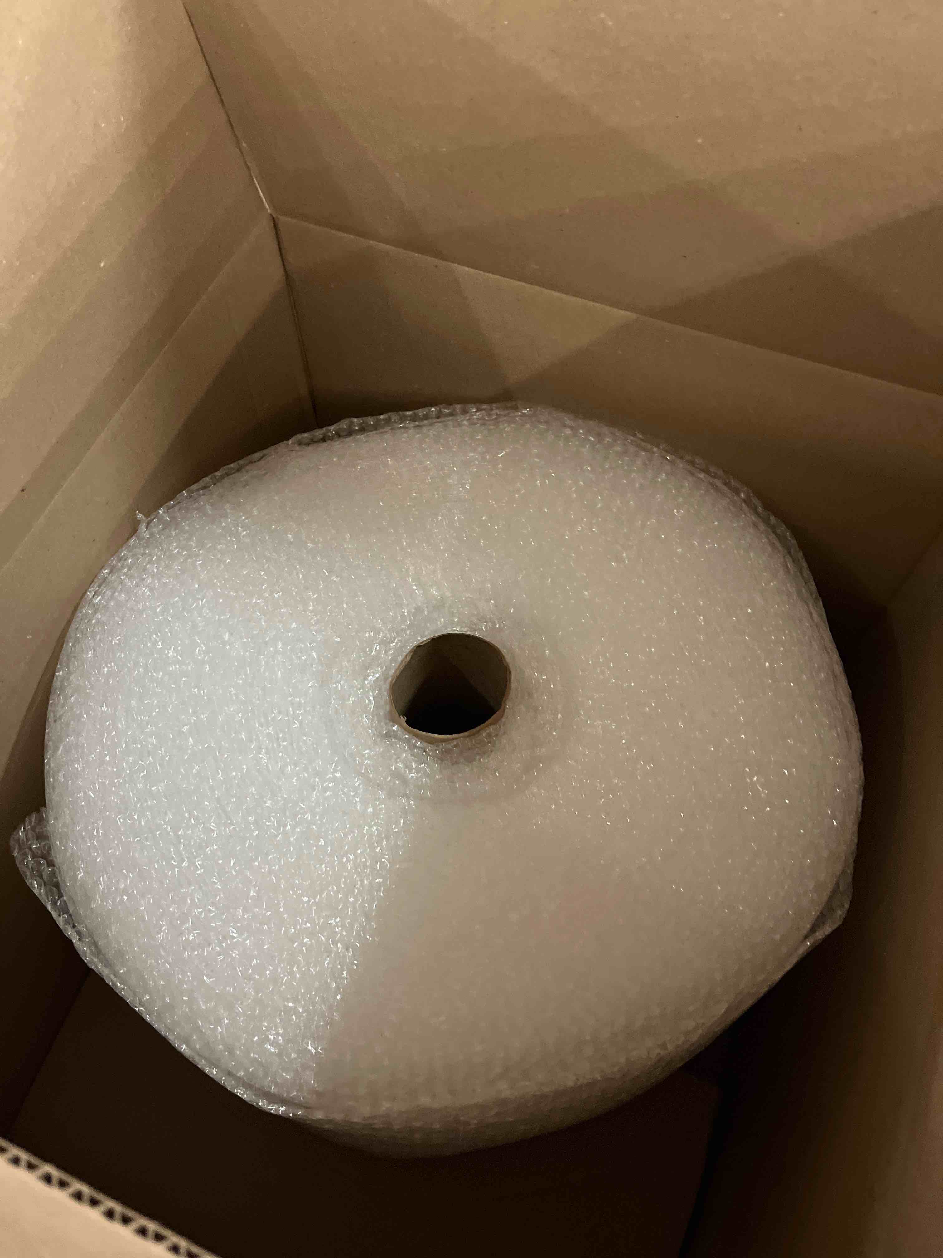 Condition photo showing New/Like New for amazon basics bubble wrap for moving, packing, shipping and storage, perforated protective cushioning for fragile items, 12-inch x 175-ft long roll, small 3/16", clear