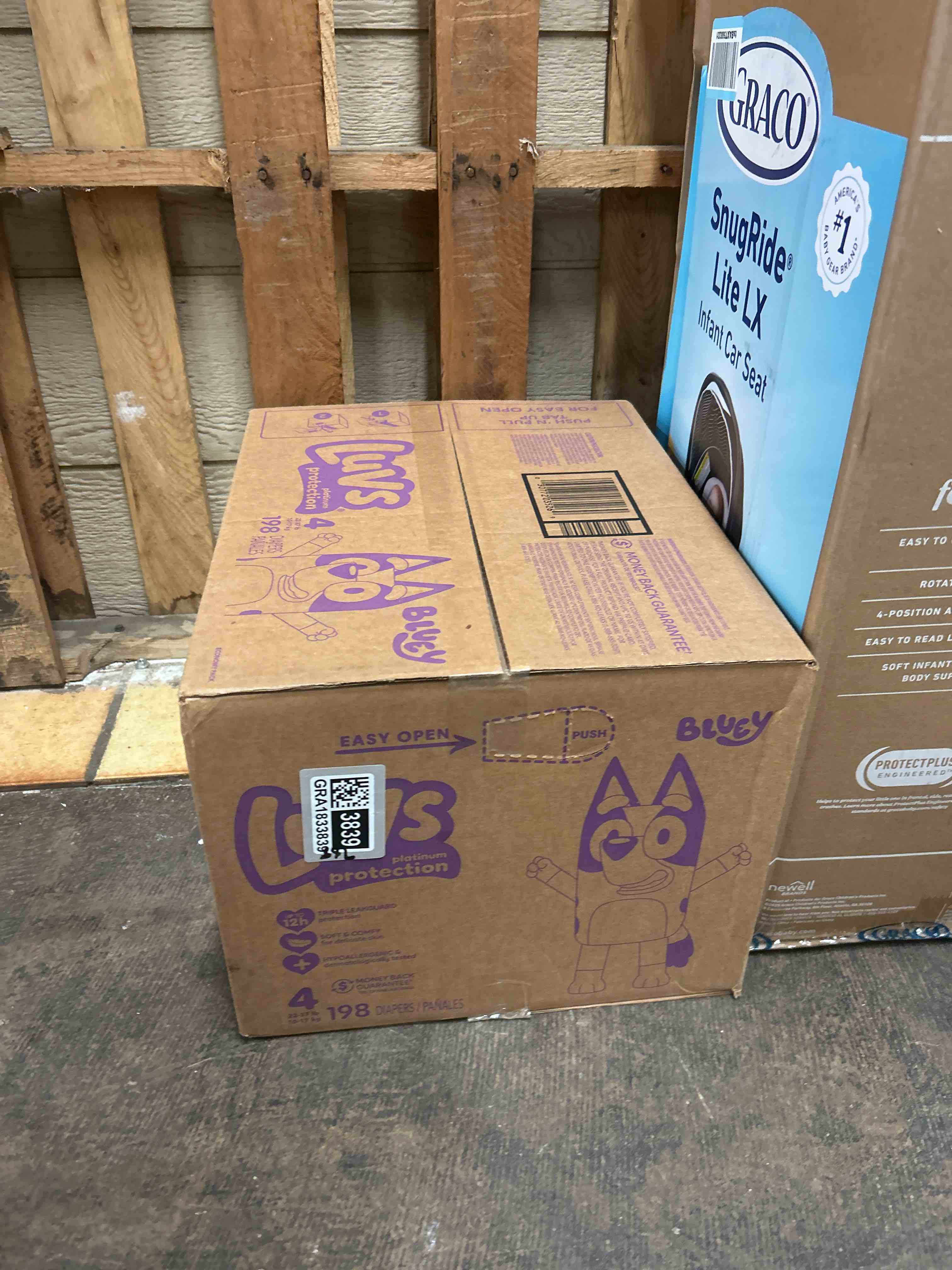 Condition photo showing New/Like New for luvs size 4 baby diapers, platinum protection bluey diapers for day & night, size 4, 198 count (packaging may vary)