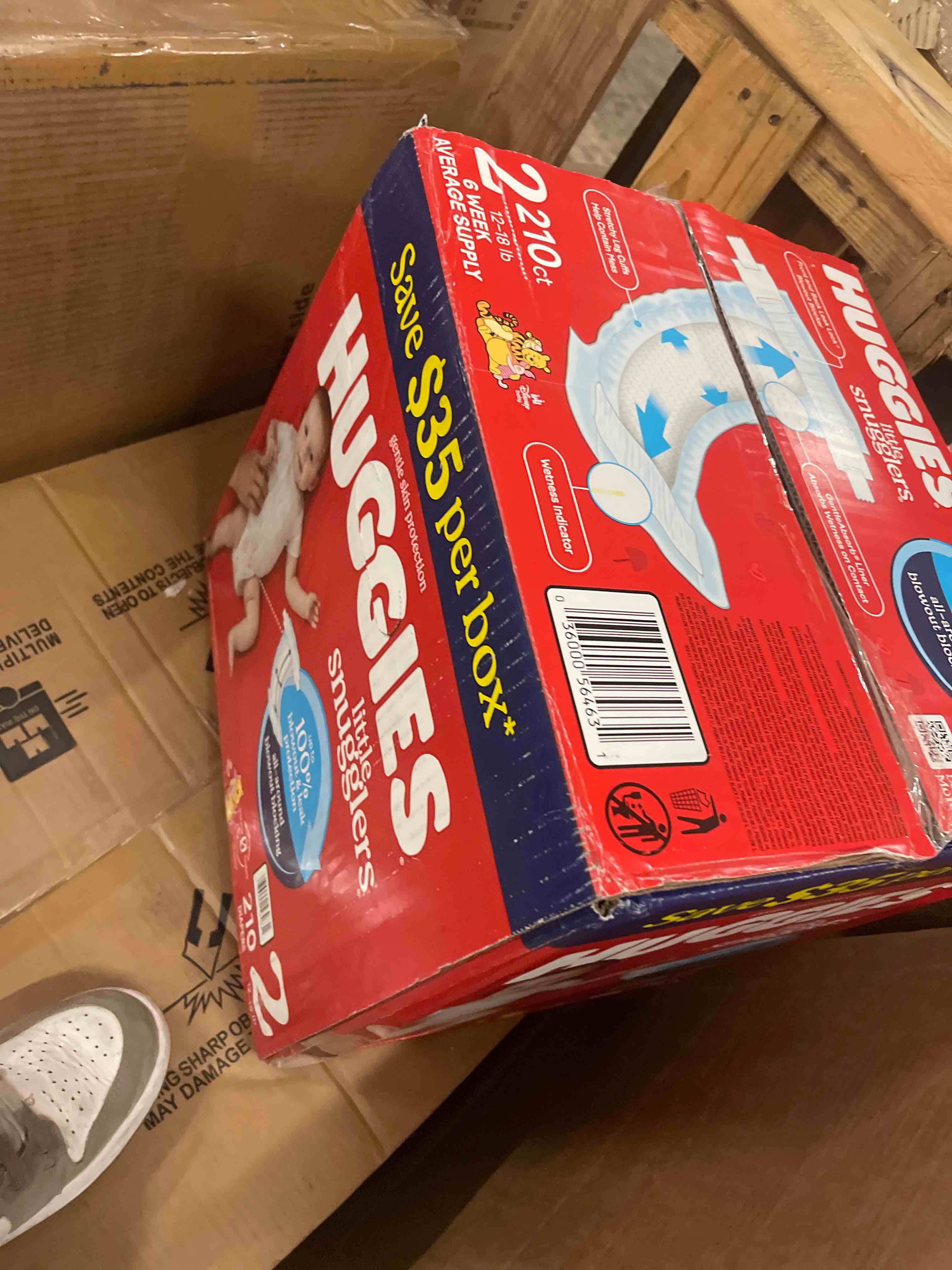 Condition photo showing New/Like New for huggies little snugglers baby diapers size 2 (12-18 lb) 210 count