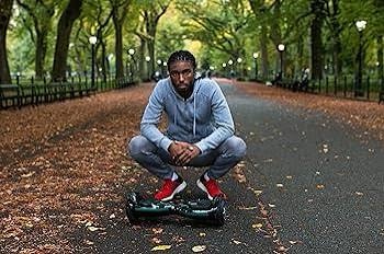 hover-1 superfly electric self balancing scooter with 7mph top speed, 6 mile range, long lasting li-ion battery - 5hr full charge, built-in bluetooth speaker - rider modes: beginner to expert