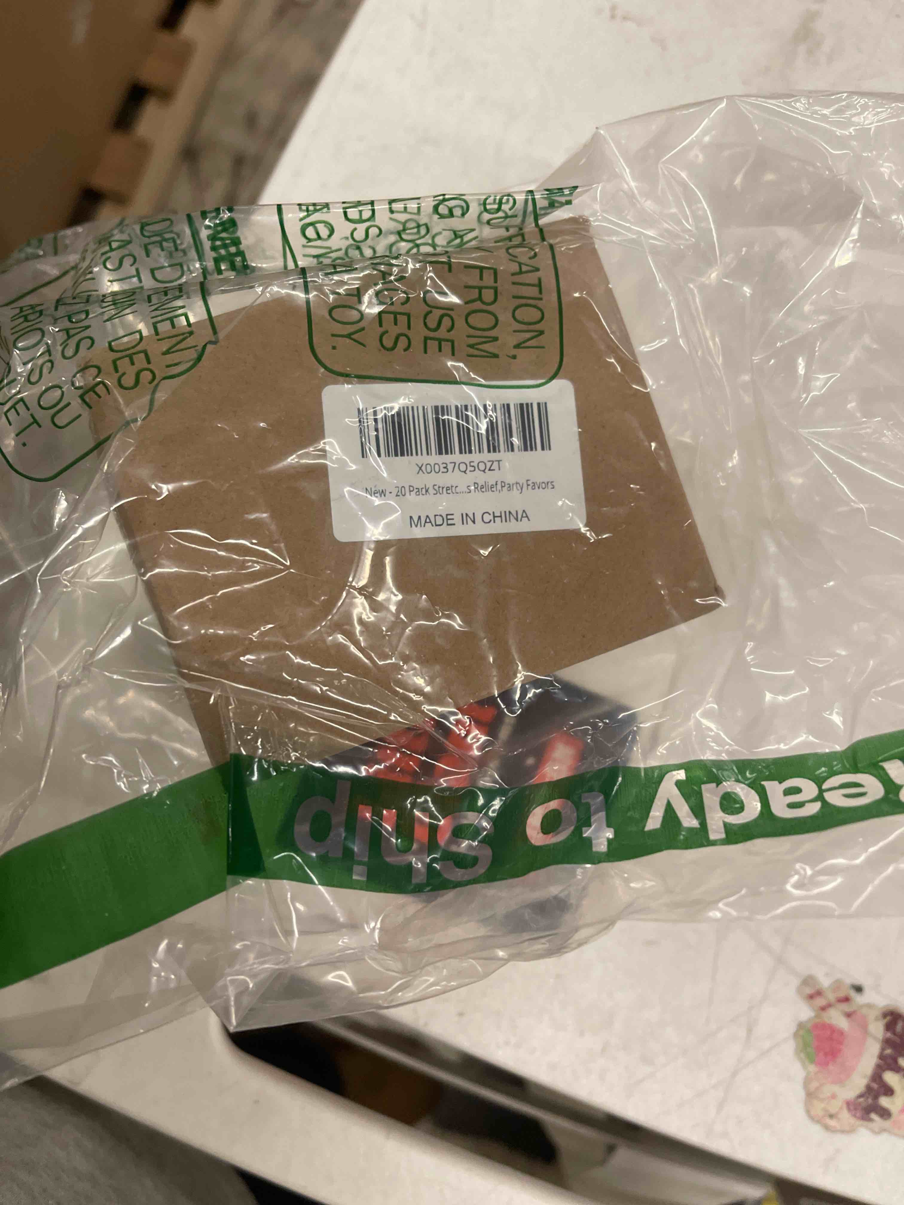 Condition photo showing New/Like New for 20 Pack Stretchy String Fidget Toys,Sensory Fidget Stretch Toys,Sensory Noodle Strings for Kids Adults Stress Relief,Party Favors 20 Pcs Unicorn