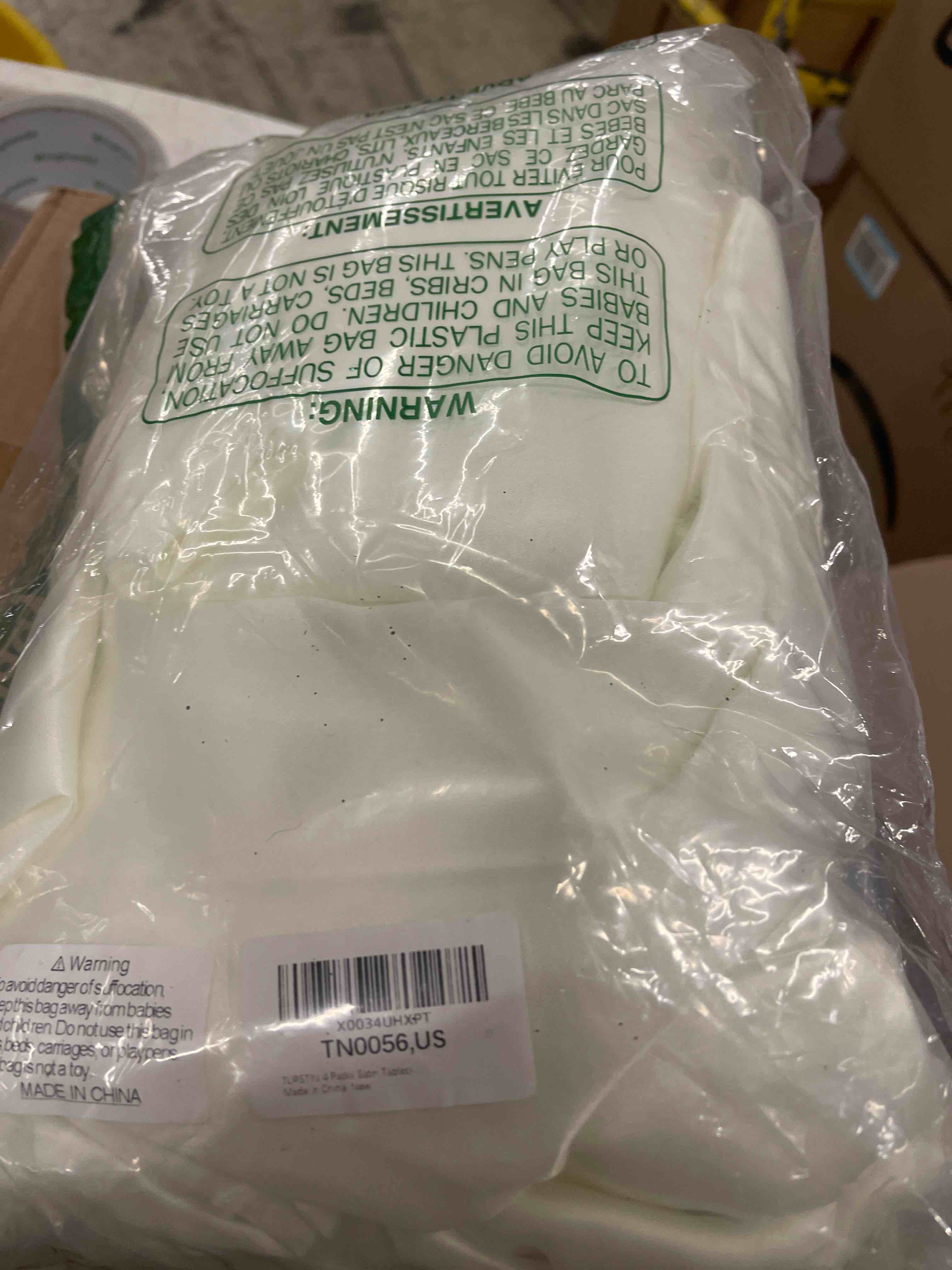 Condition photo showing New/Like New for TURSTIN 4 Packs Satin Tablecloth 102 x 58 Inch Overlay Satin Table Cover Rectangle Bright Silk Tablecloth Smooth Fabric Table Decoration for Wedding Banquet Party Events, Ivory Ivory 4