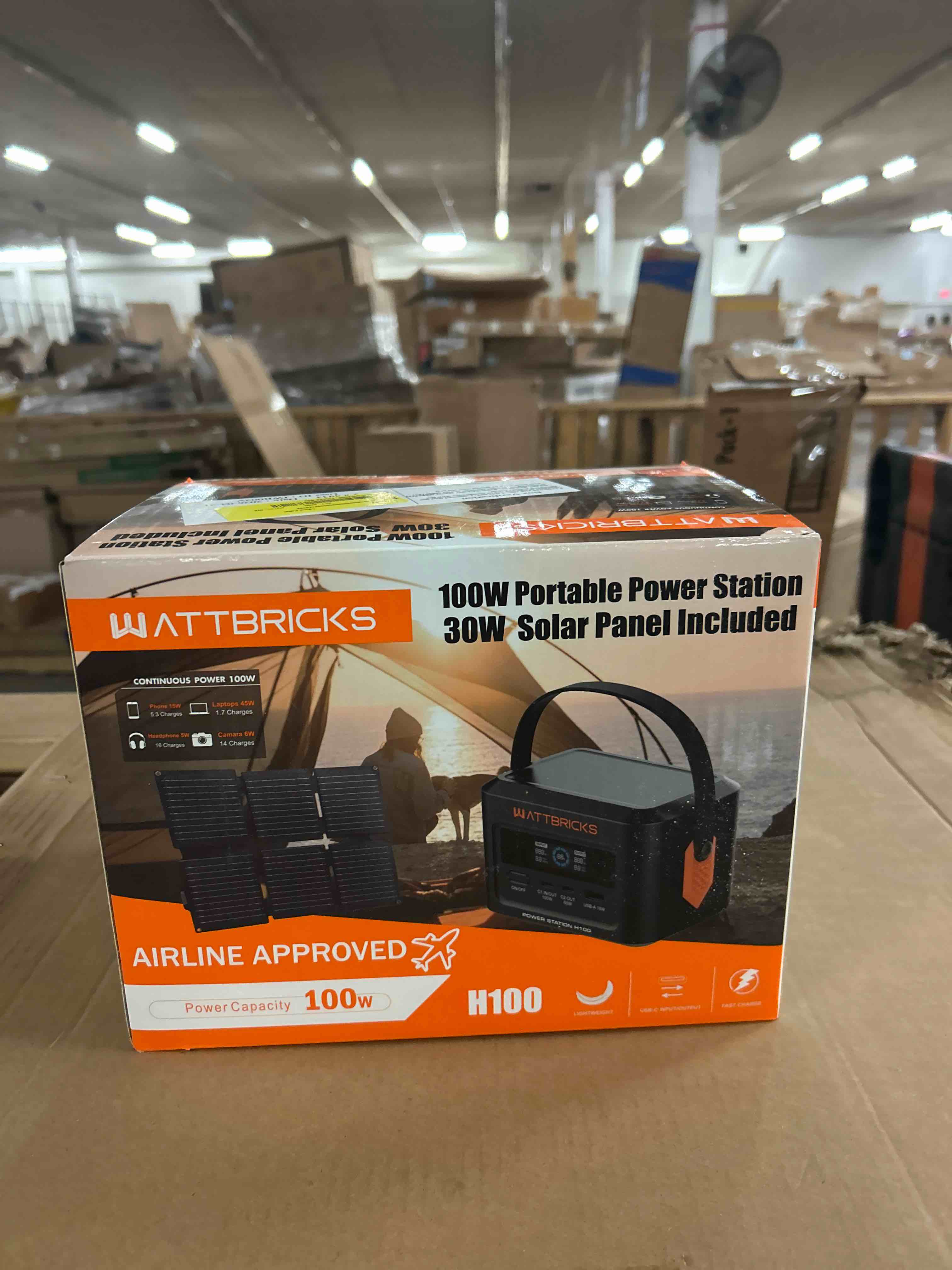 Condition photo showing New/Like New for wattbricks energy 120w peak portable power & 30-watt portable solar panel bundle