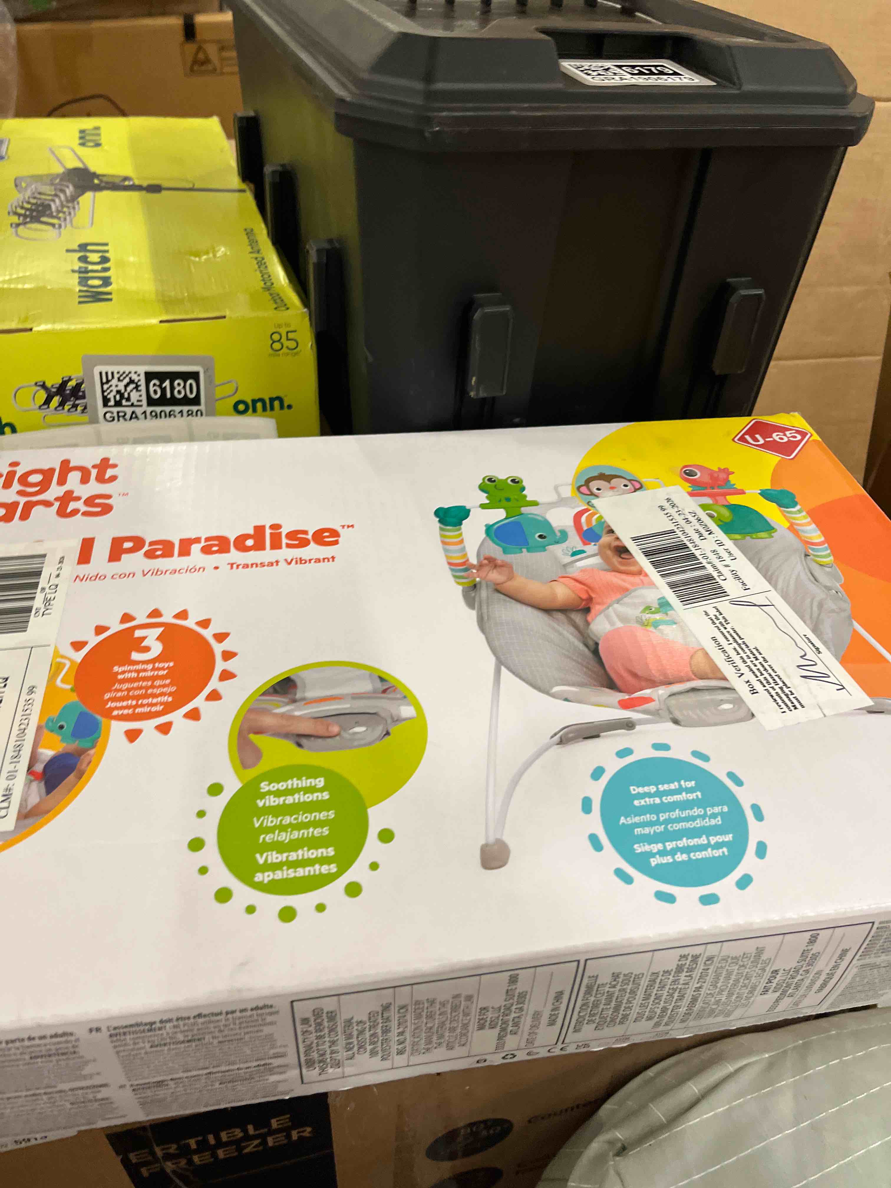 Condition photo showing New/Like New for bright starts playful paradise vibrating baby bouncer with toys