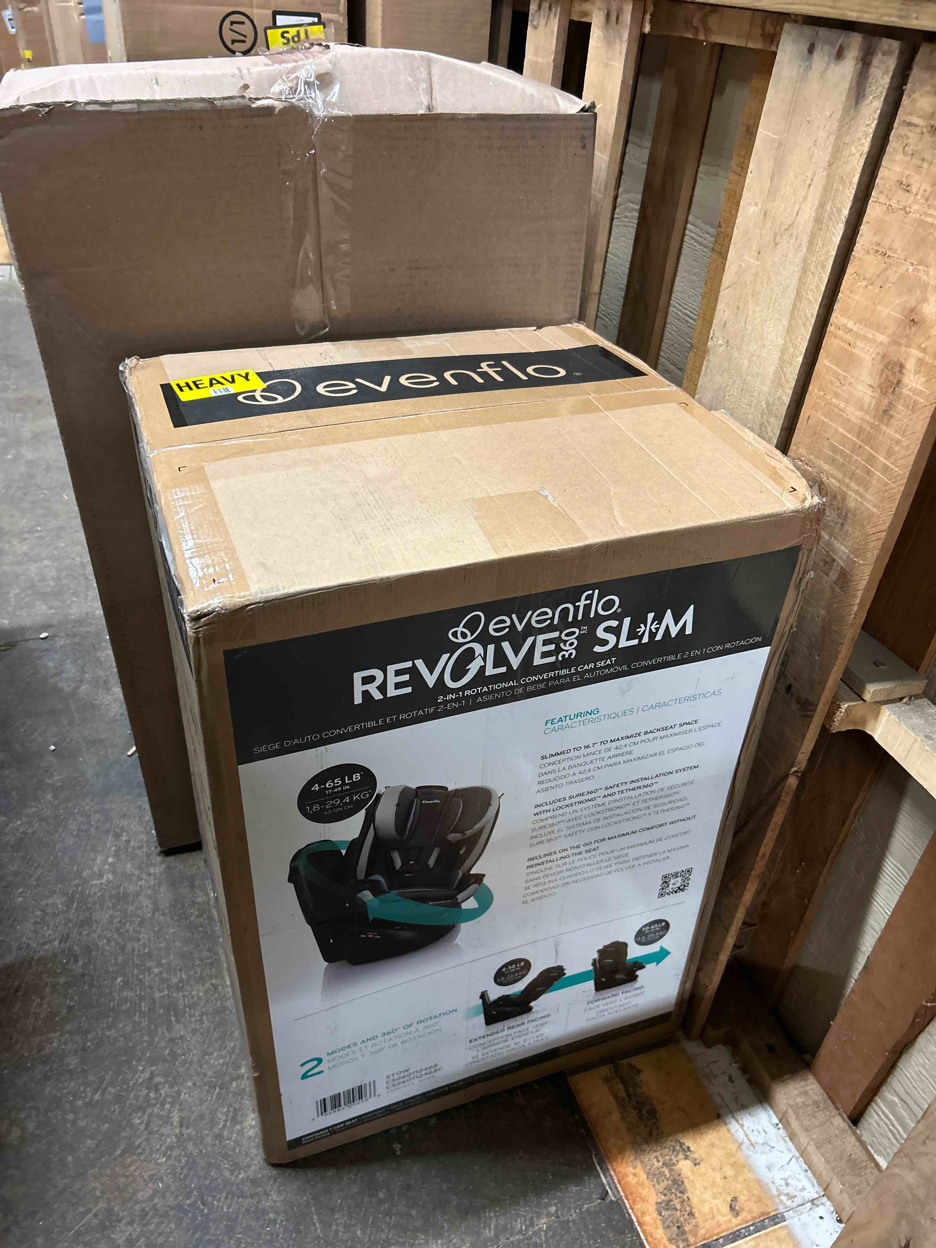 Condition photo showing New/Like New for evenflo revolve360 slim 2-in-1 rotational car seat with quick clean cover (stow blue)