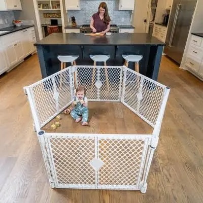 Condition photo showing New/Like New for toddleroo by north states superyard 6 panel baby play yard. playpen or extra wide baby gate, wall mount kit included. made in usa. 38.5" - 201" wide, 5.5 ft corner to corner play yard (26" tall, gray)
