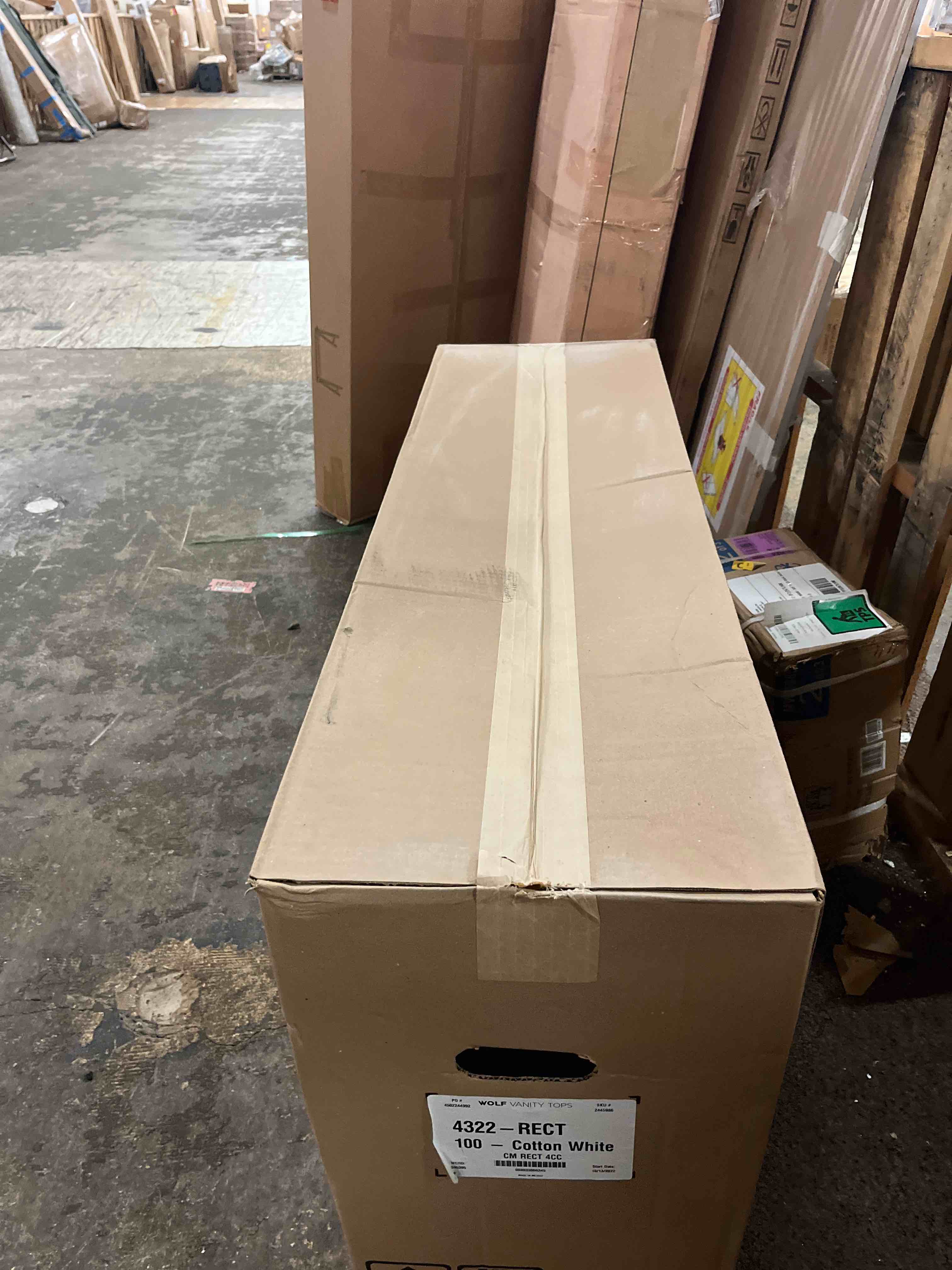 Condition photo showing New/Like New for wolf home vanity top in cultured marble single flush rectangular bowl, 43x22- cotton white