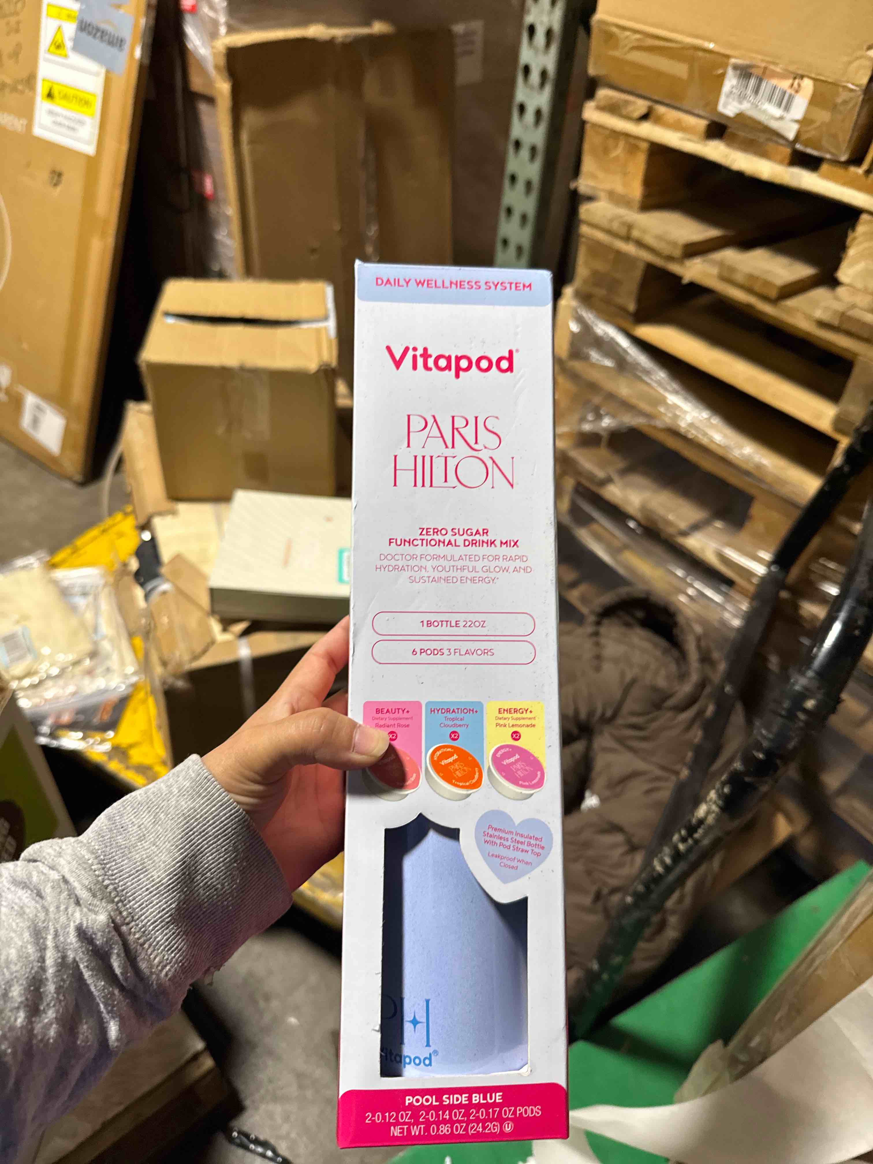 Condition photo showing New/Like New for Vitapod Paris Hilton x Daily Wellness System - 22oz Pearlescent Water Bottle in Poolside Blue & 6 Drink Mix Pod Sampler, Includes BEAUTY+, HYDRATION+, and ENERGY+ Functional Drink Mix Pods