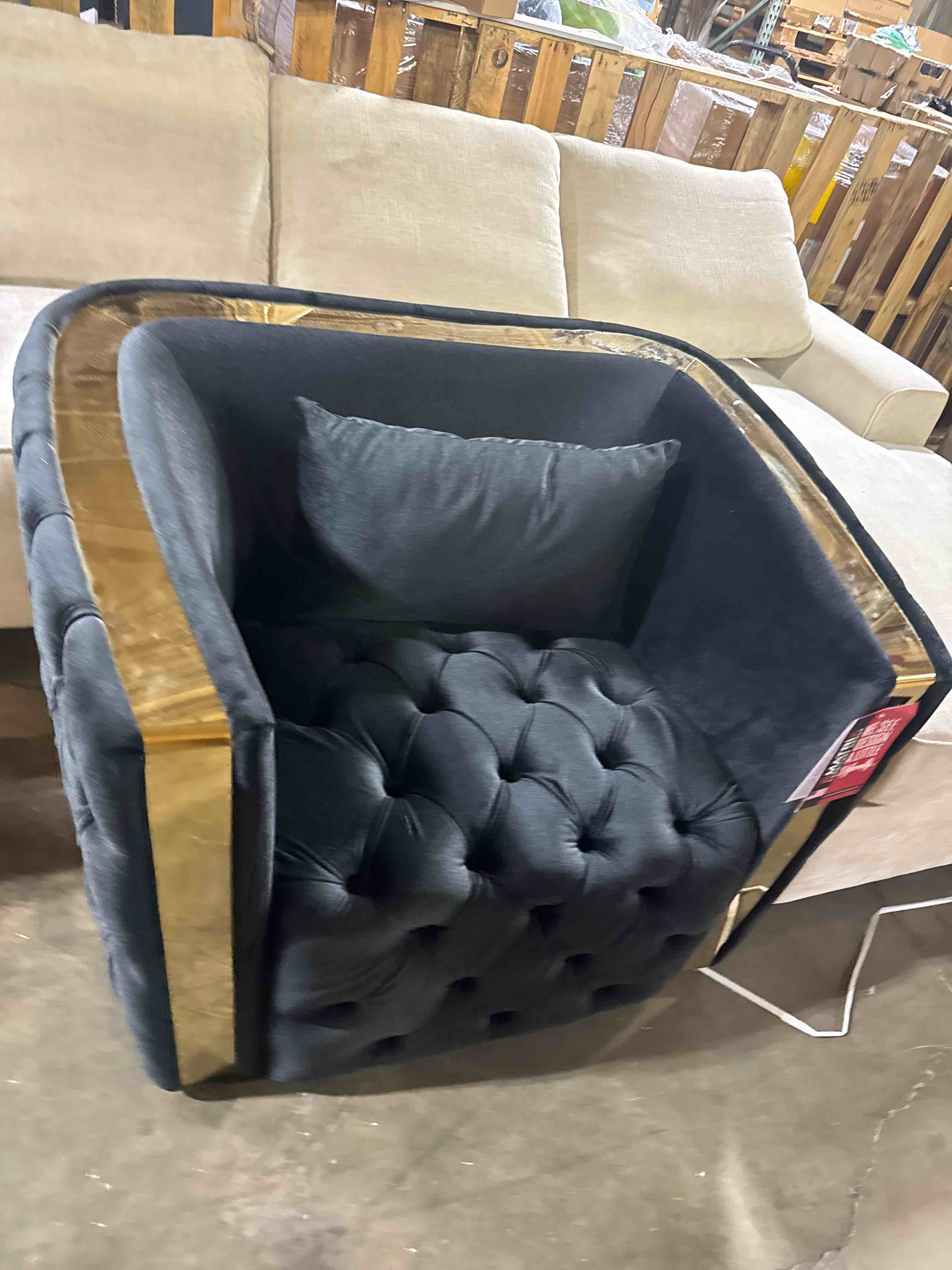 Condition photo showing New/Like New for button tufted chair ( one in stock has a different pillow)
