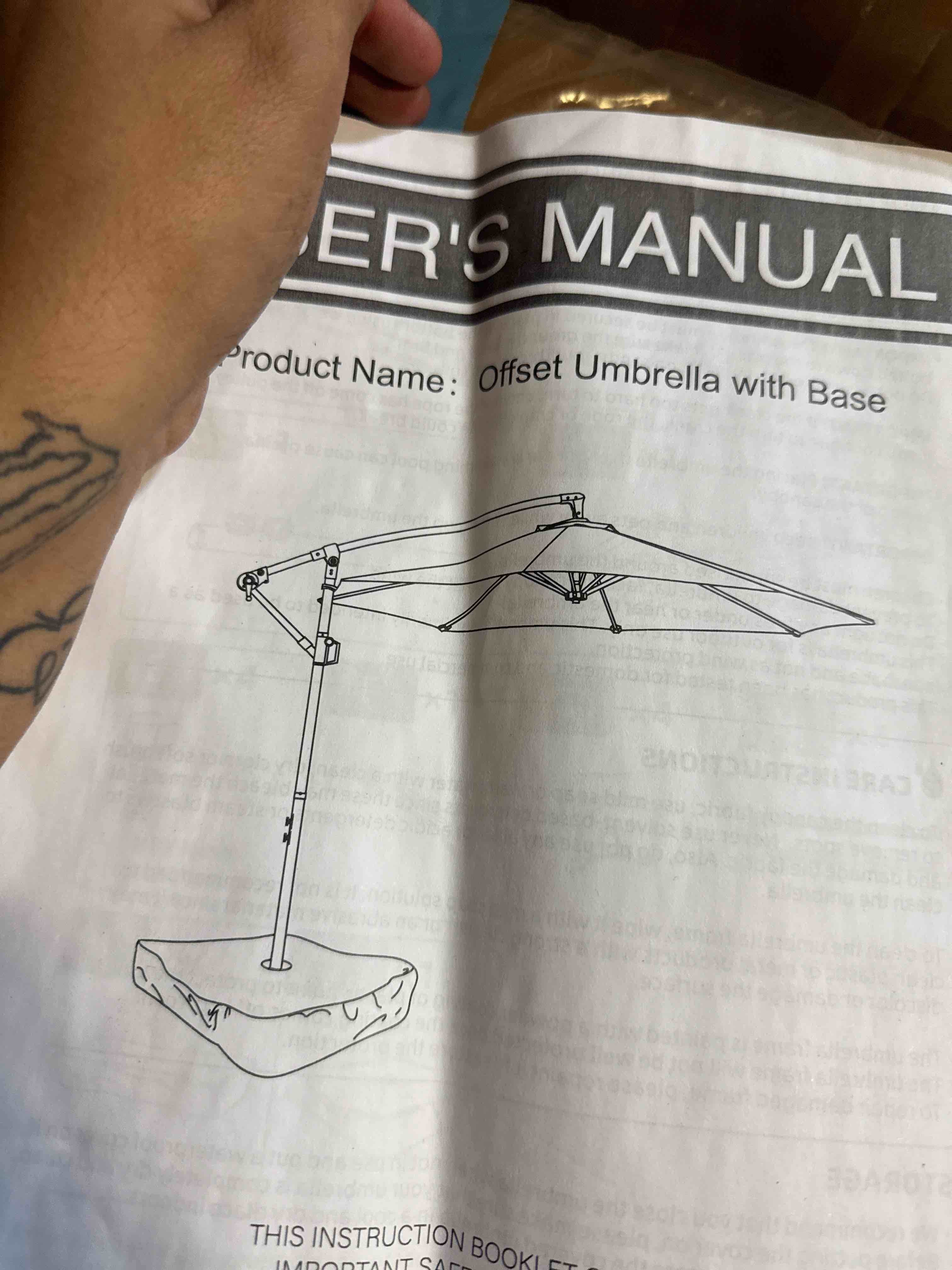 Condition photo showing New/Like New for 10 ft offset umbrella with base ( black)