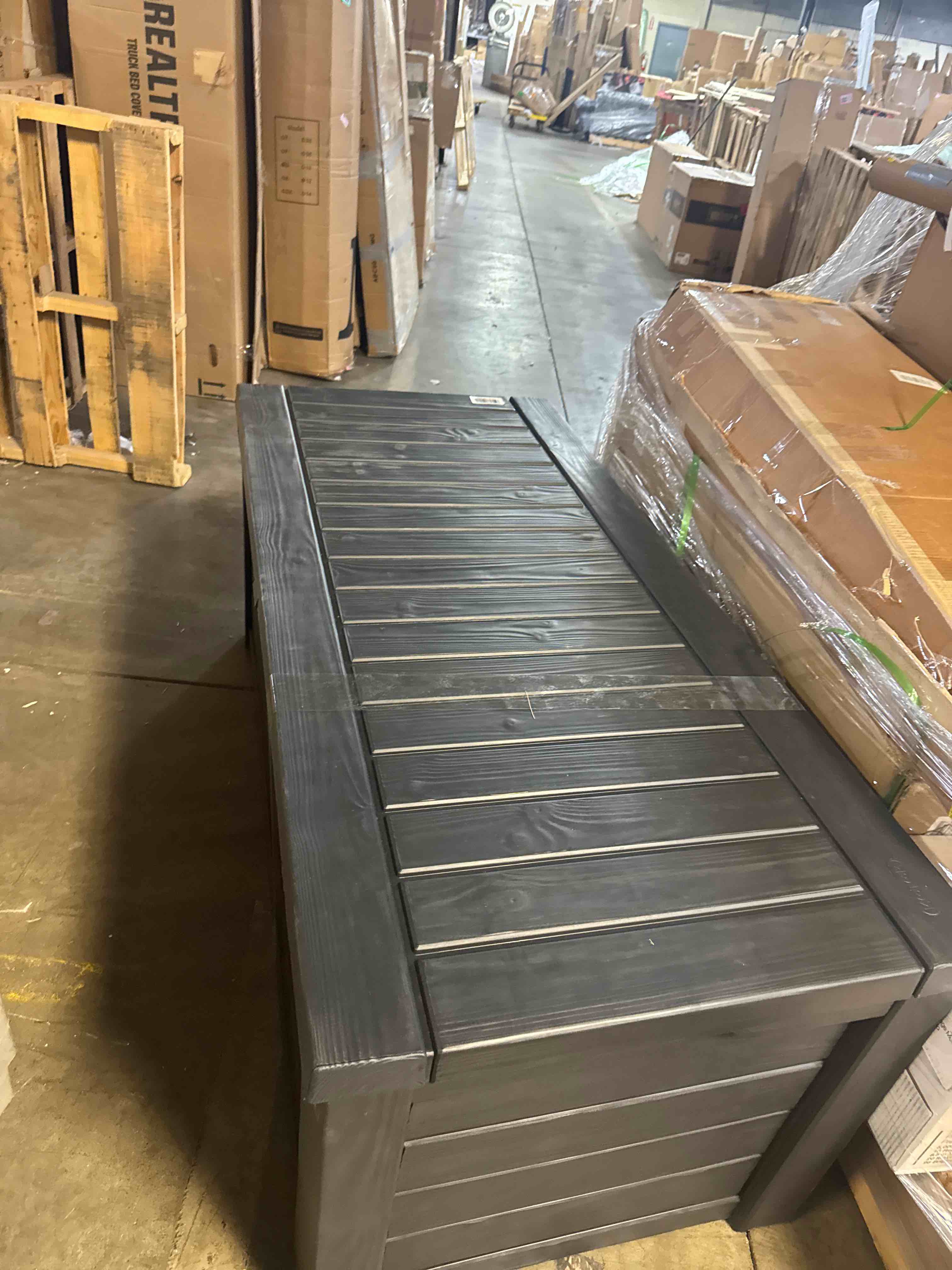 Condition photo showing Good Condition for keter 150 gallon resin large outdoor storage box for patio furniture, outdoor cushions, garden tools and pool floats, dark grey